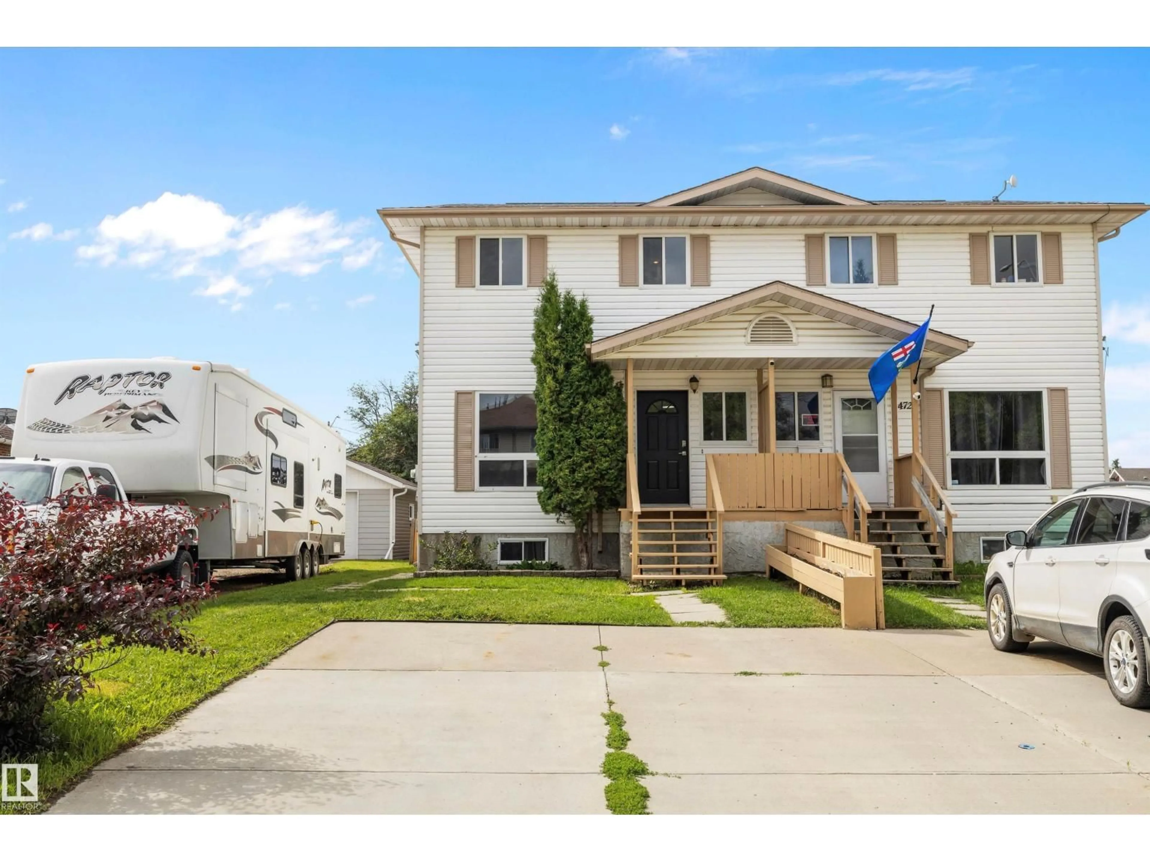 Home with vinyl exterior material, street for 4719 49 AV, Calmar Alberta T0C0V0