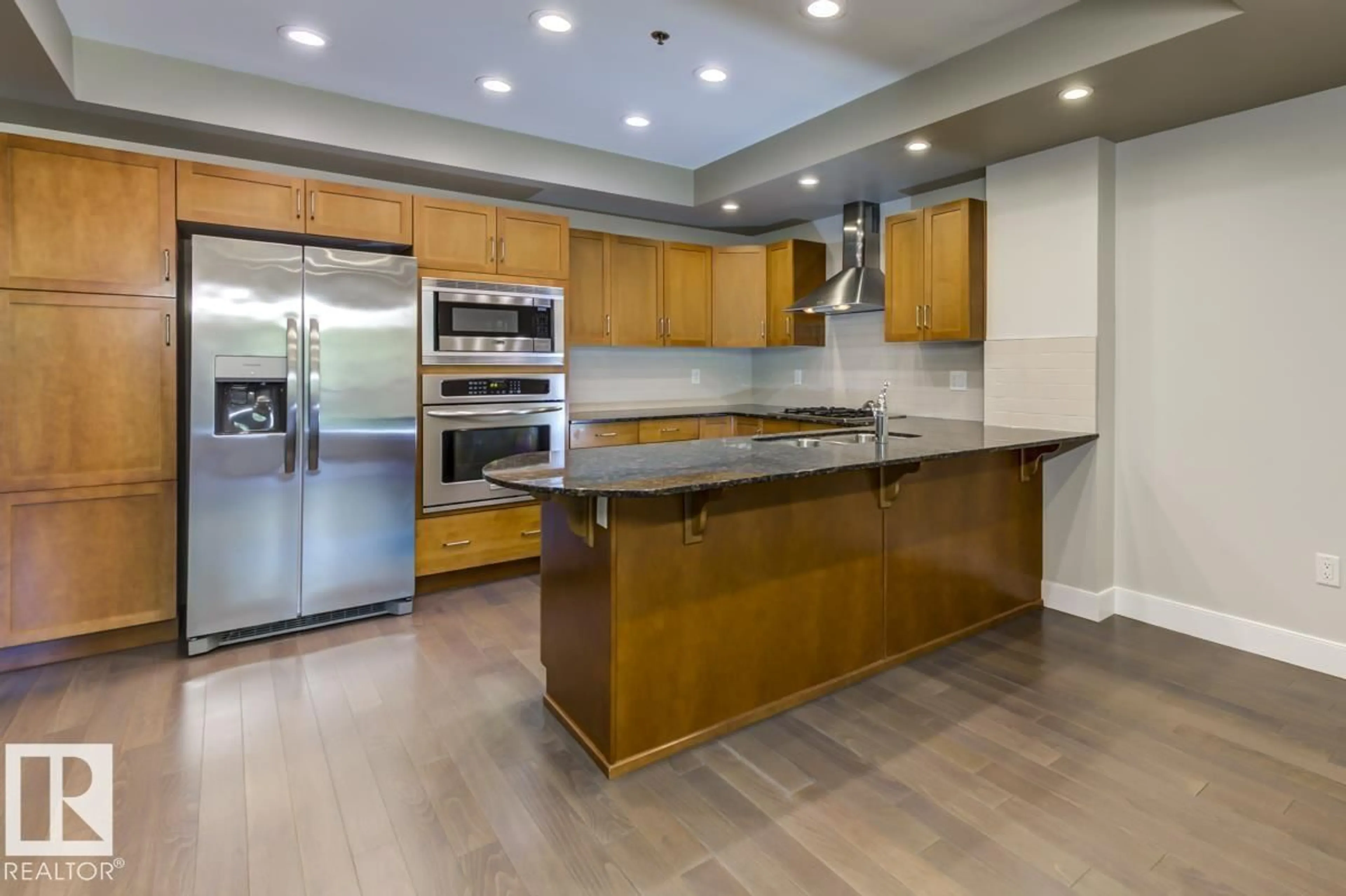 Open concept kitchen, unknown for 205 9316 82 AV, Edmonton Alberta T6C0Z6