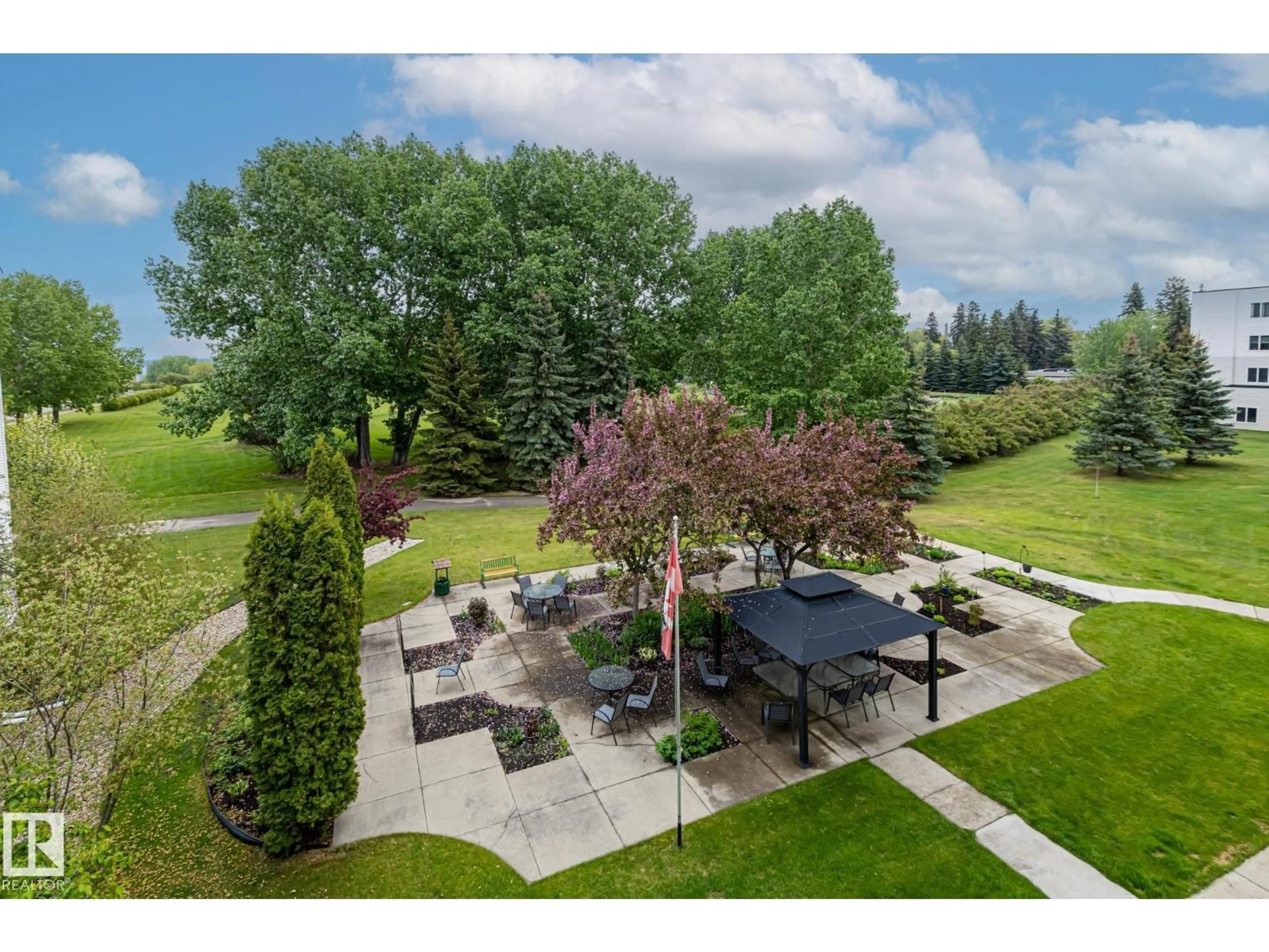 A pic from outside/outdoor area/front of a property/back of a property/a pic from drone, unknown for 78 - 203 MCKENNEY AV, St. Albert Alberta T8N1L9