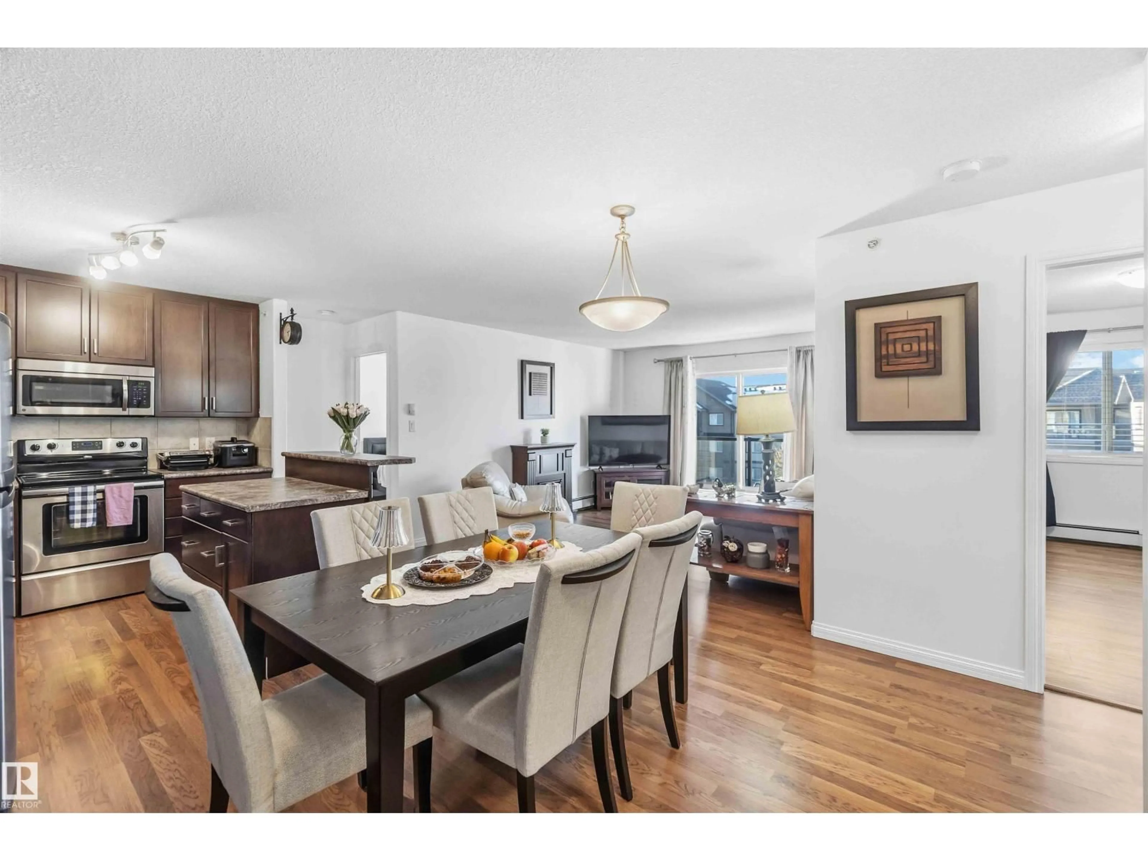 Dining room, wood/laminate floor for #414 - 1204 156 ST, Edmonton Alberta T6R0R6