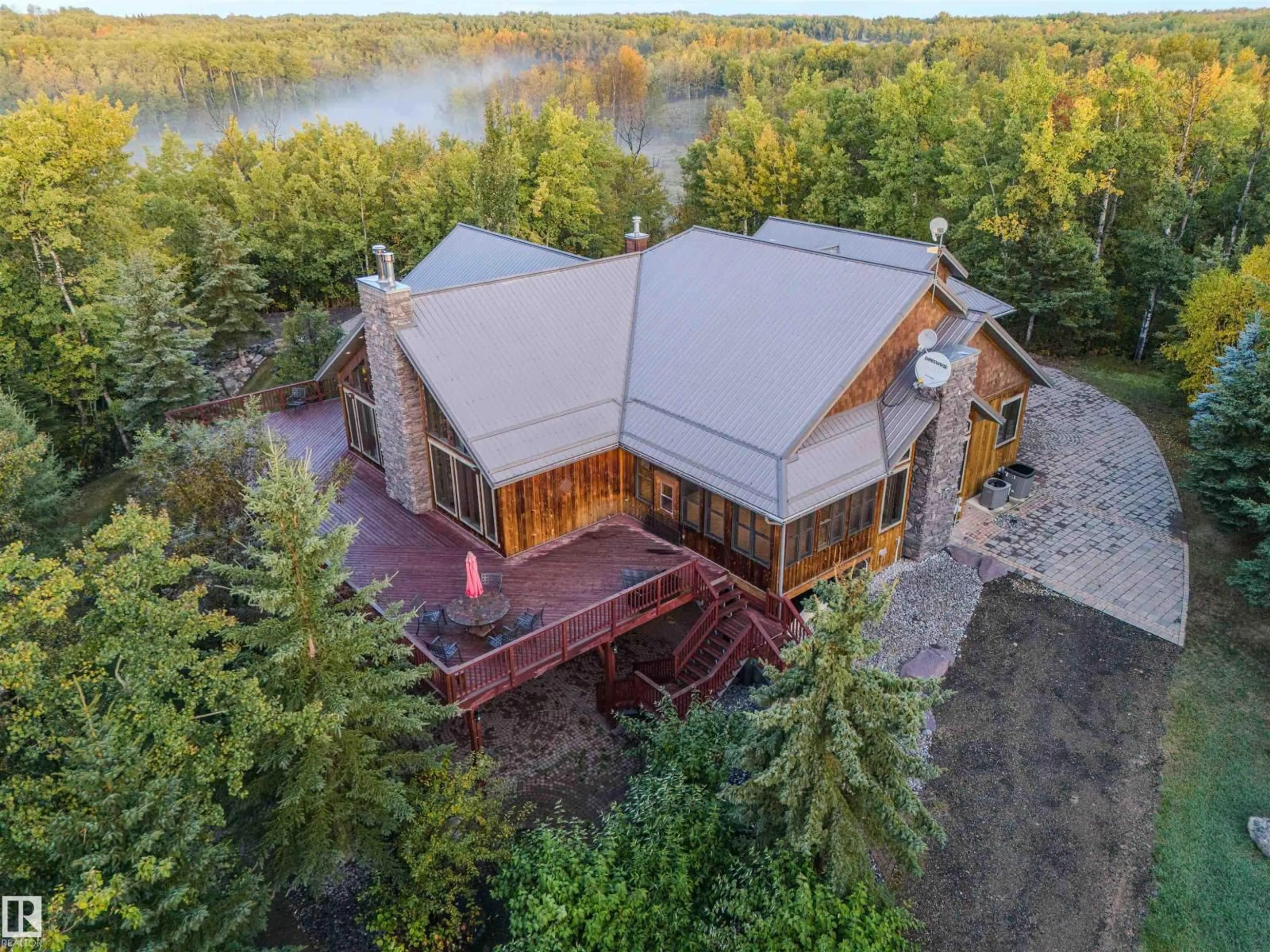 A pic from outside/outdoor area/front of a property/back of a property/a pic from drone, water/lake/river/ocean view for 52117 RR 213, Rural Strathcona County Alberta T8G1B5