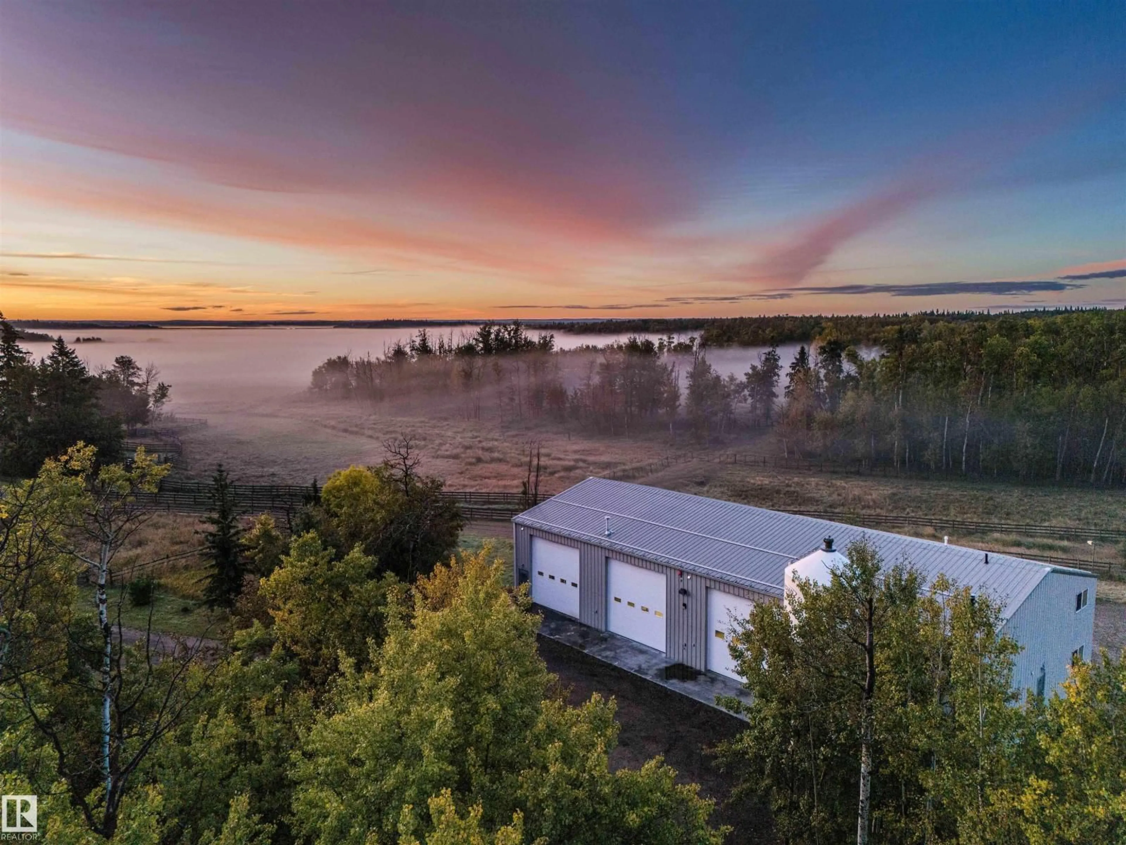A pic from outside/outdoor area/front of a property/back of a property/a pic from drone, water/lake/river/ocean view for 52117 RR 213, Rural Strathcona County Alberta T8G1B5