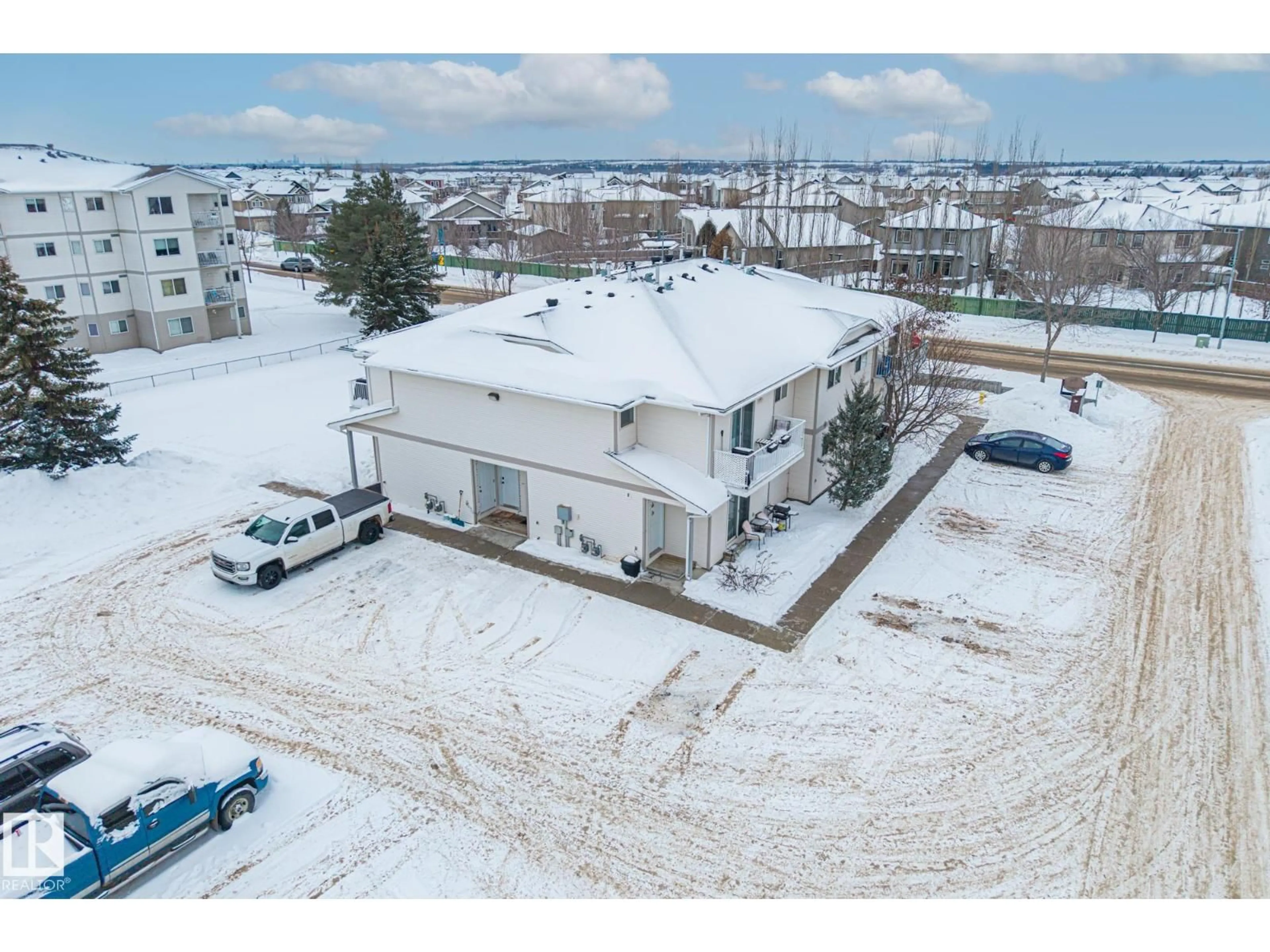 A pic from outside/outdoor area/front of a property/back of a property/a pic from drone, building for #103A - 110 WESTPARK, Fort Saskatchewan Alberta T8L4M2
