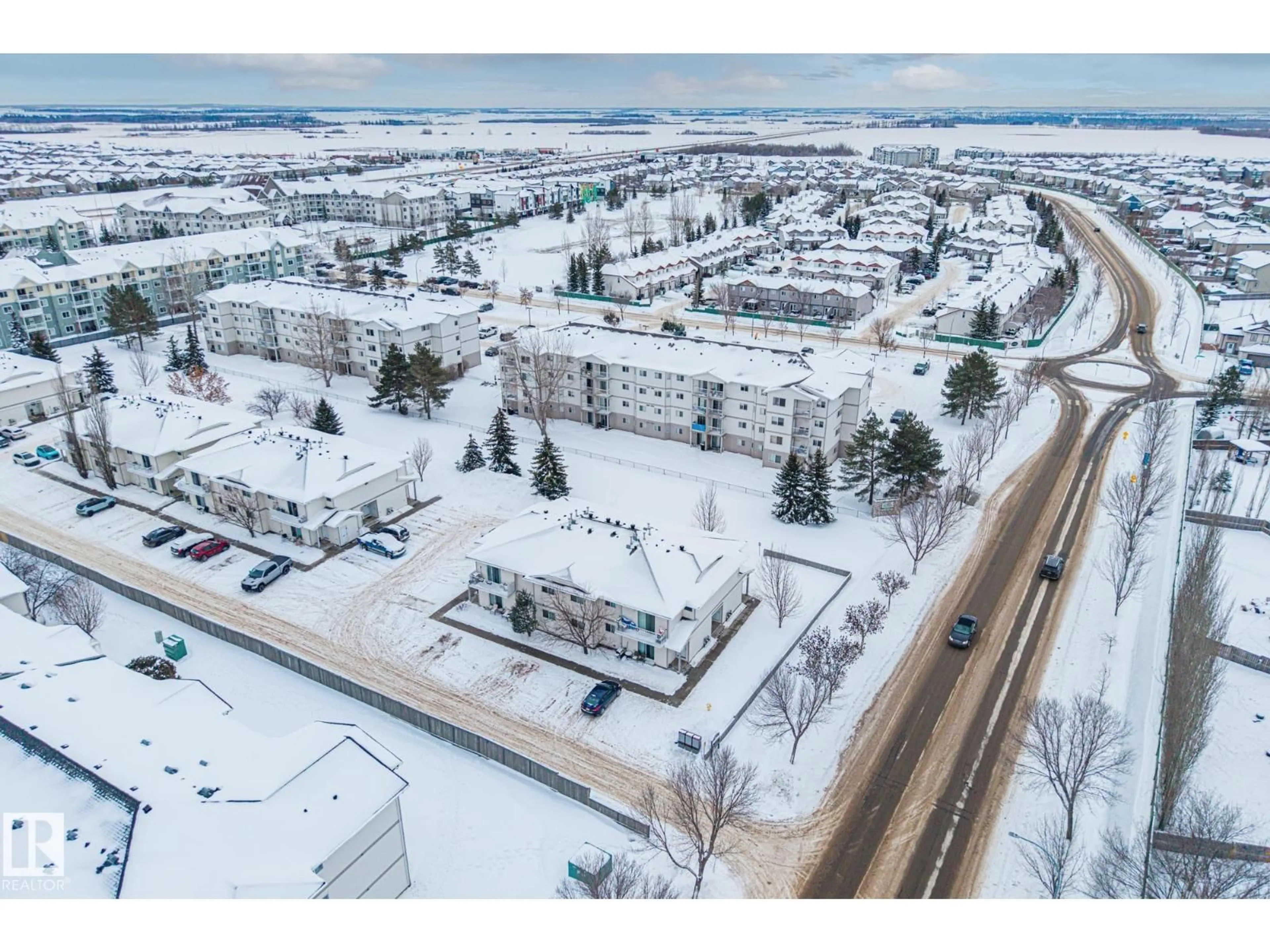 A pic from outside/outdoor area/front of a property/back of a property/a pic from drone, street for #103A - 110 WESTPARK, Fort Saskatchewan Alberta T8L4M2