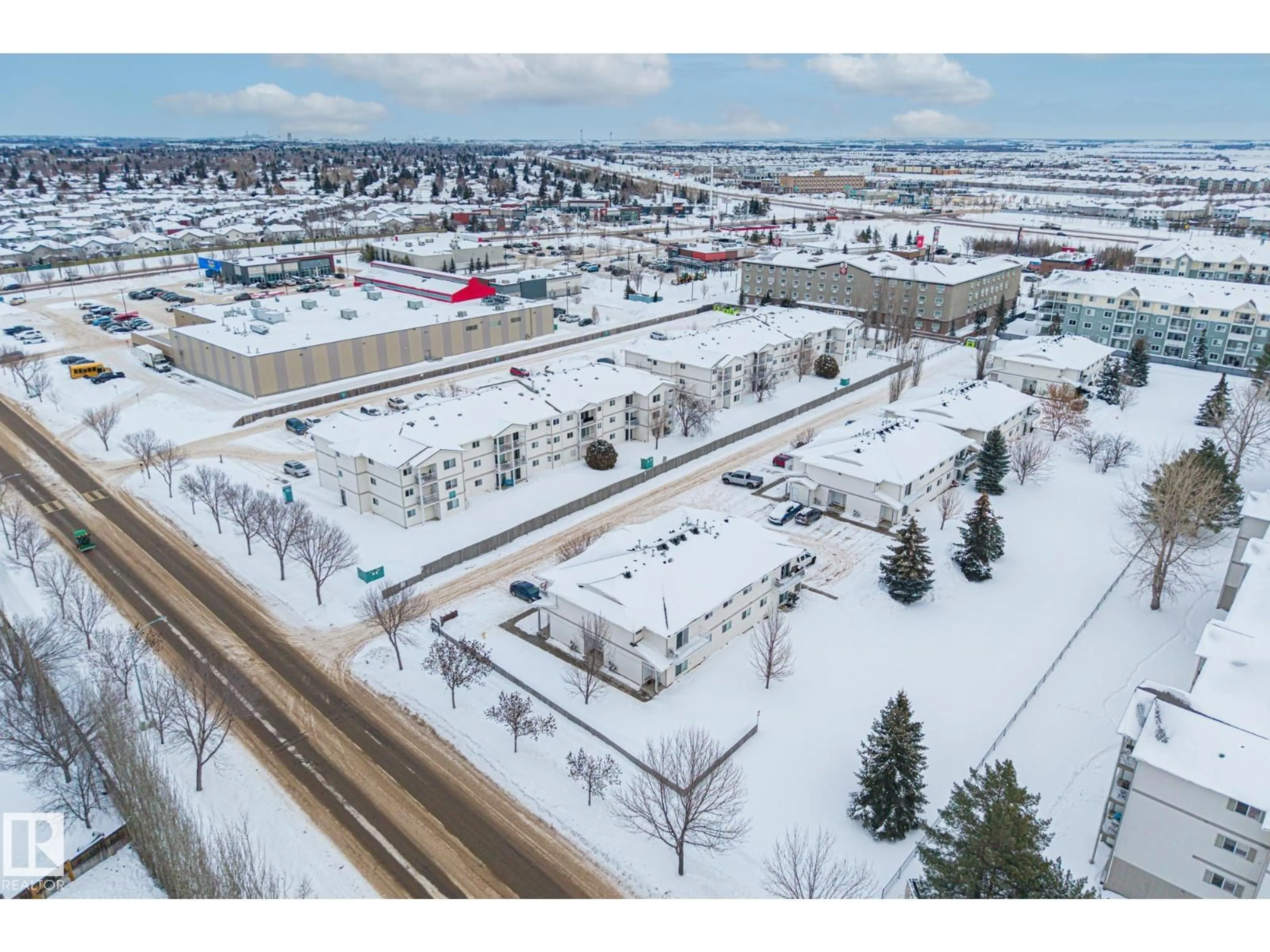 A pic from outside/outdoor area/front of a property/back of a property/a pic from drone, street for #103A - 110 WESTPARK, Fort Saskatchewan Alberta T8L4M2