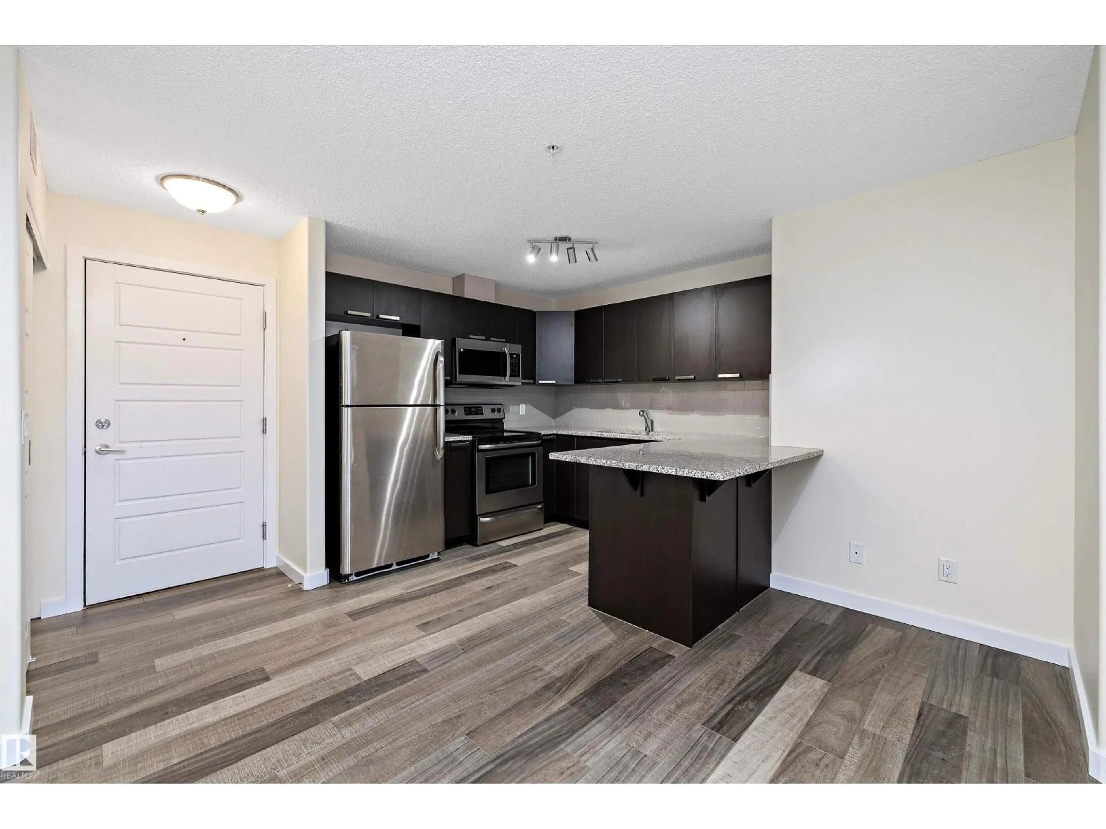 Standard kitchen, wood/laminate floor for 323 - 14808 125 ST NW, Edmonton Alberta T5X0G1