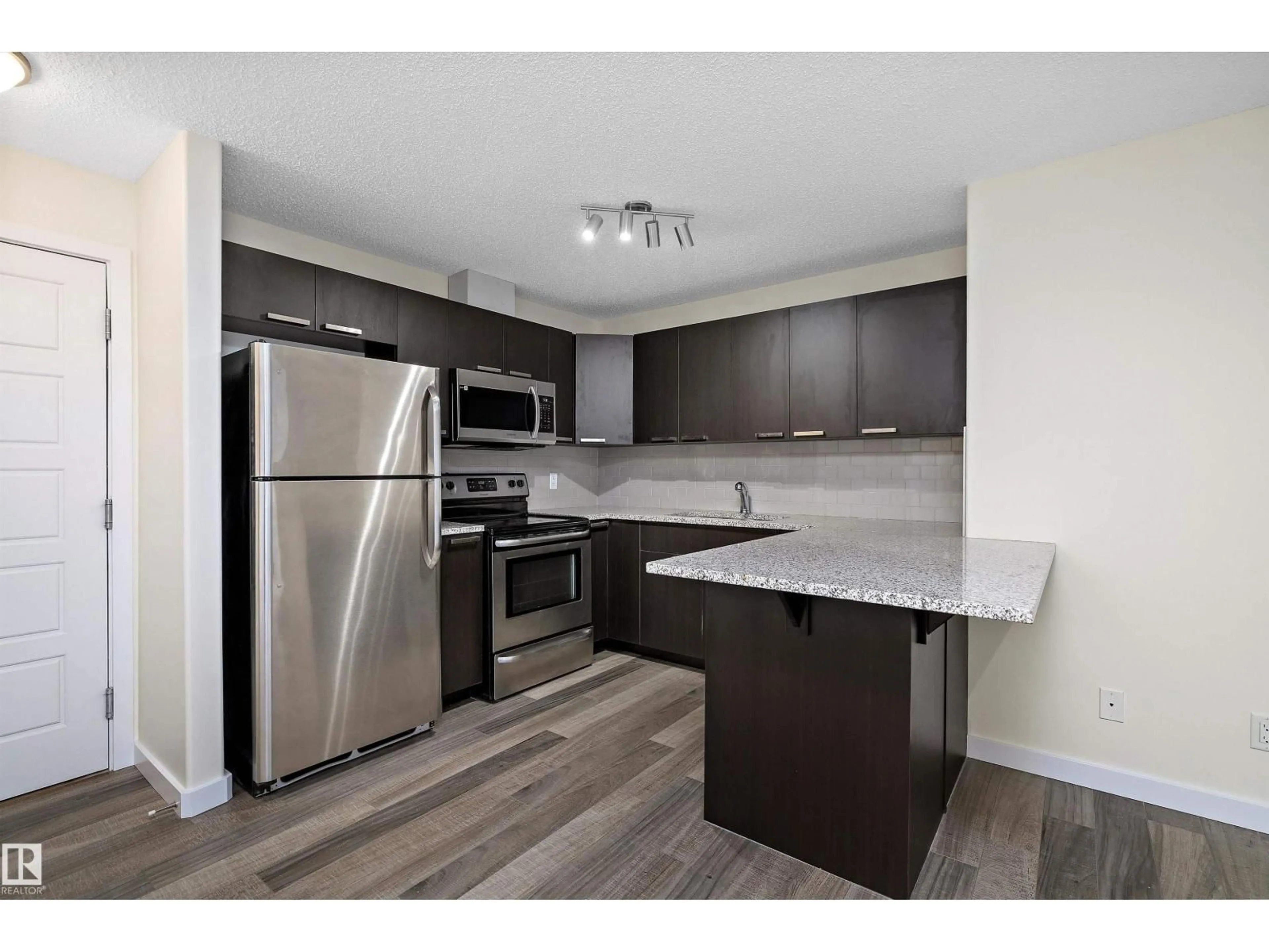 Standard kitchen, wood/laminate floor for 323 - 14808 125 ST NW, Edmonton Alberta T5X0G1