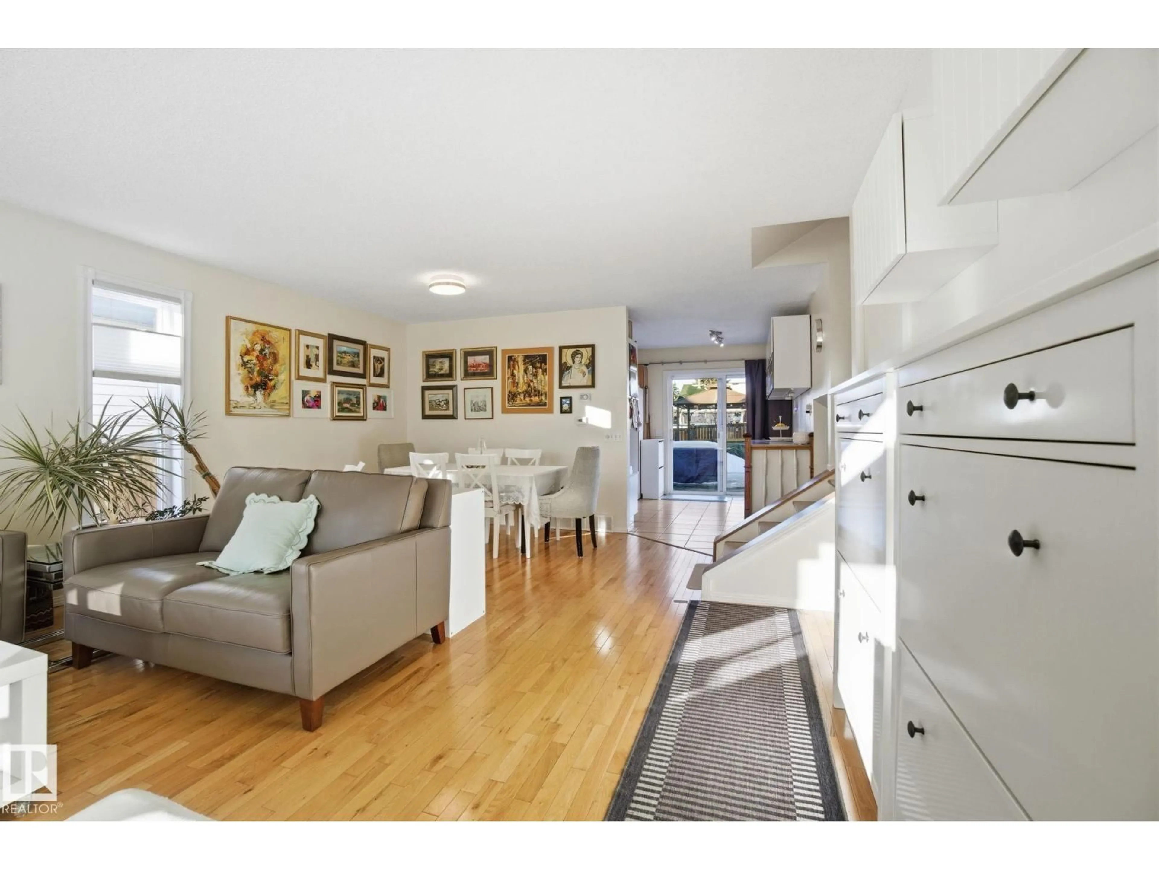 Open concept kitchen, wood/laminate floor for NW - 7620 189 ST, Edmonton Alberta T5T5H9