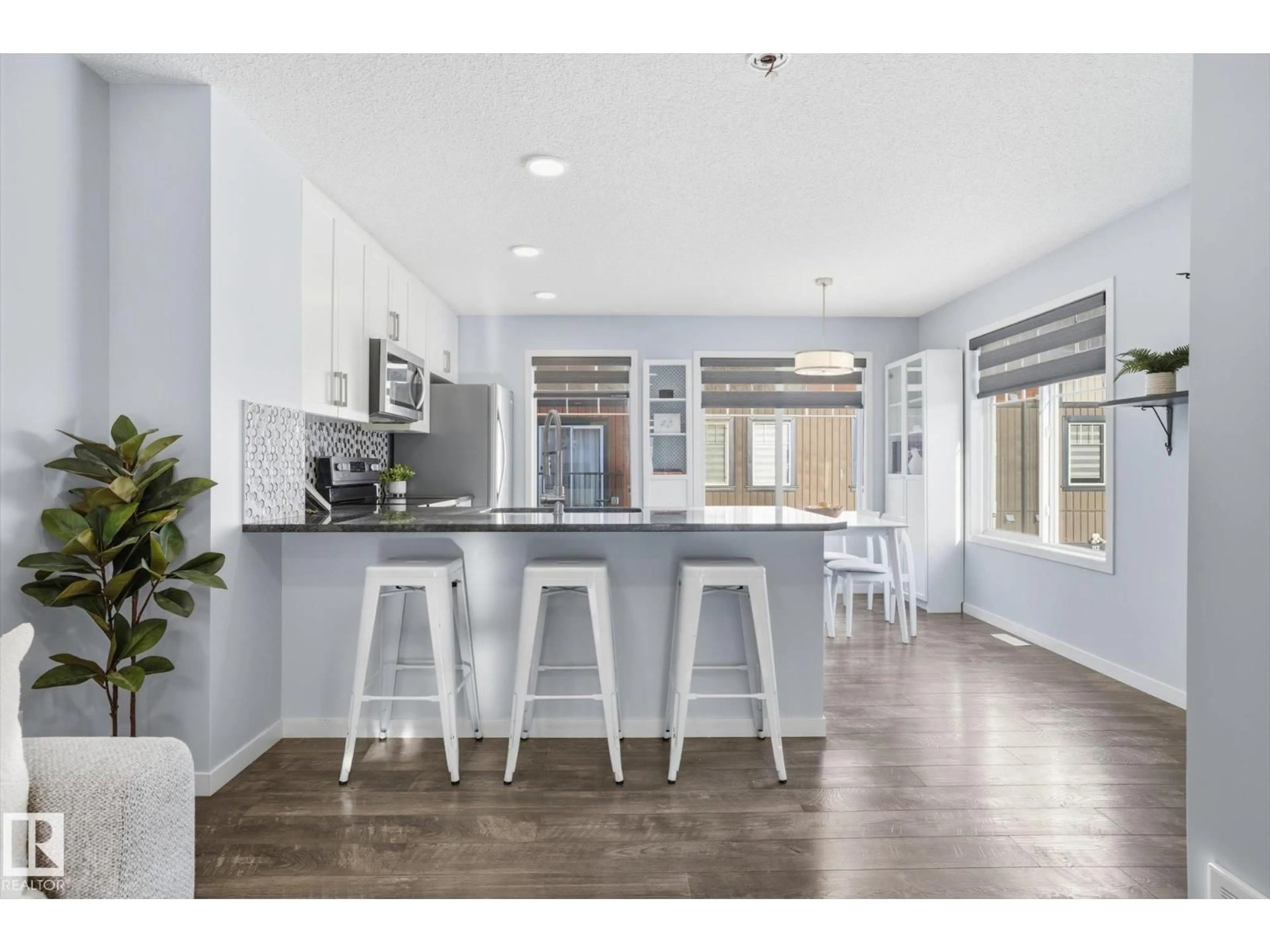 Open concept kitchen, unknown for #111 - 3305 ORCHARDS LI, Edmonton Alberta T6X2H1