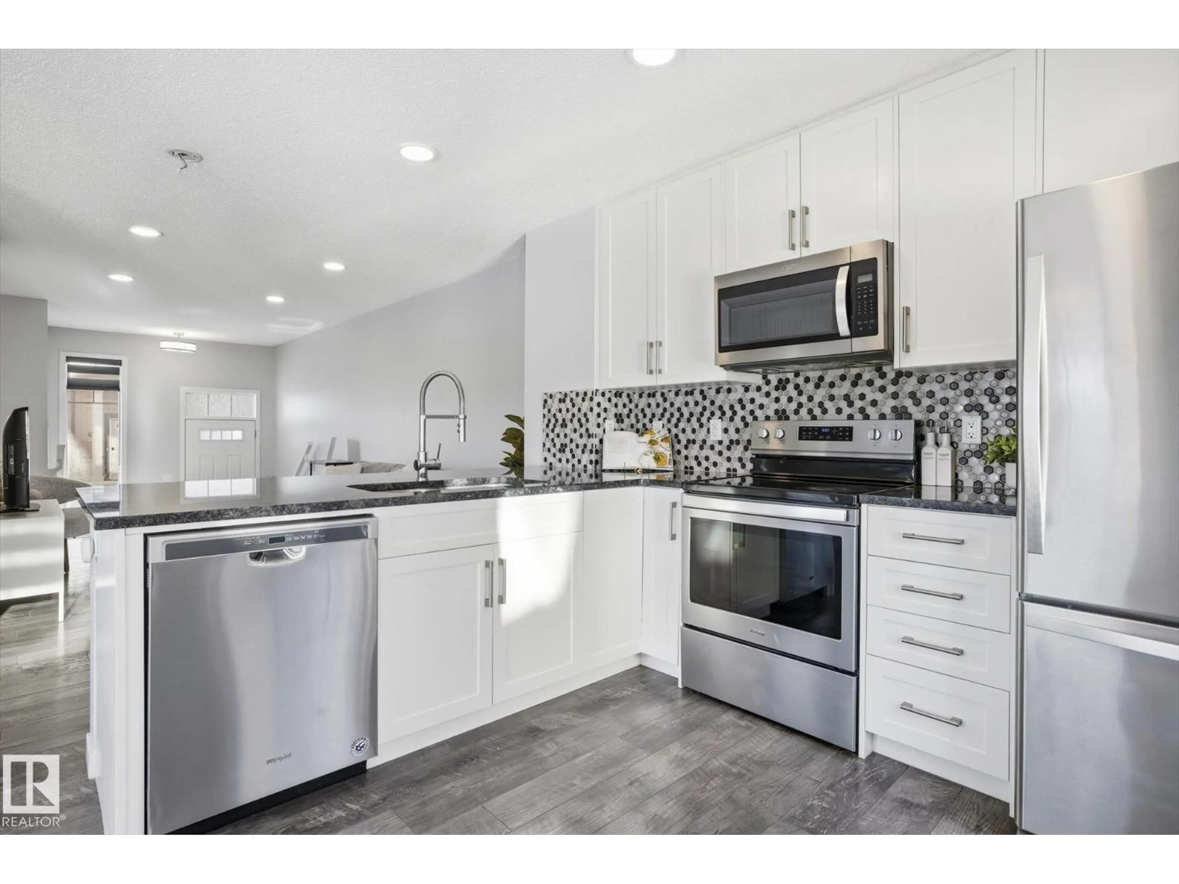 Open concept kitchen, ceramic/tile floor for #111 - 3305 ORCHARDS LI, Edmonton Alberta T6X2H1