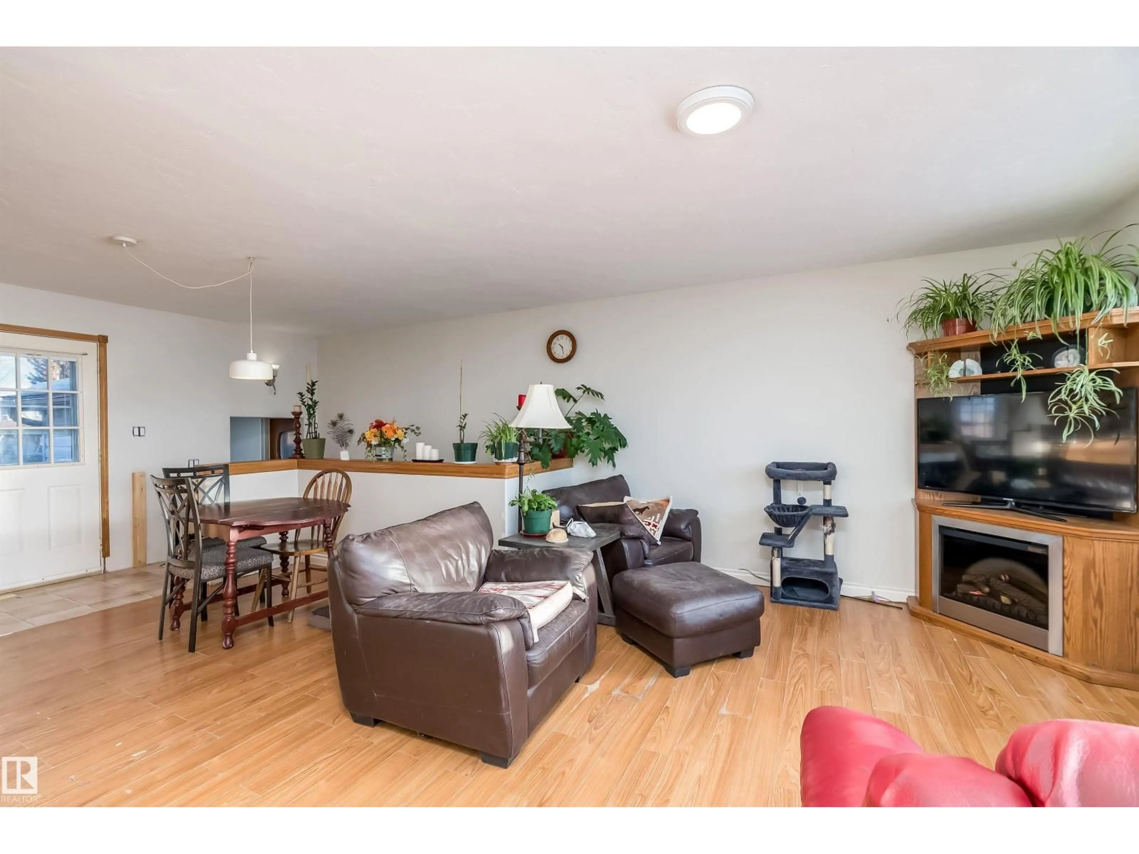 Living room with furniture, wood/laminate floor for 5132 49 AV, Onoway Alberta T0E1V0