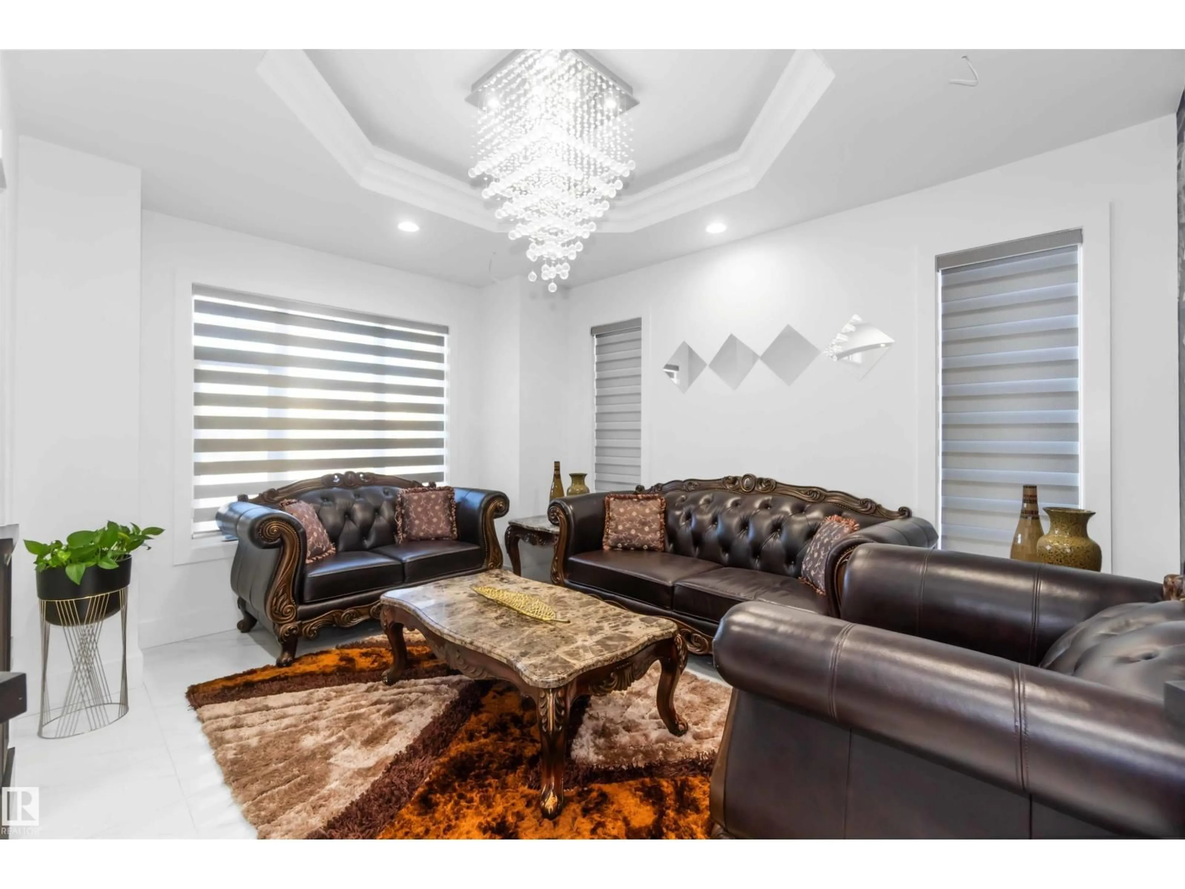 Living room with furniture, wood/laminate floor for 52327 - 315 RGE ROAD 233, Rural Strathcona County Alberta T8B1C6