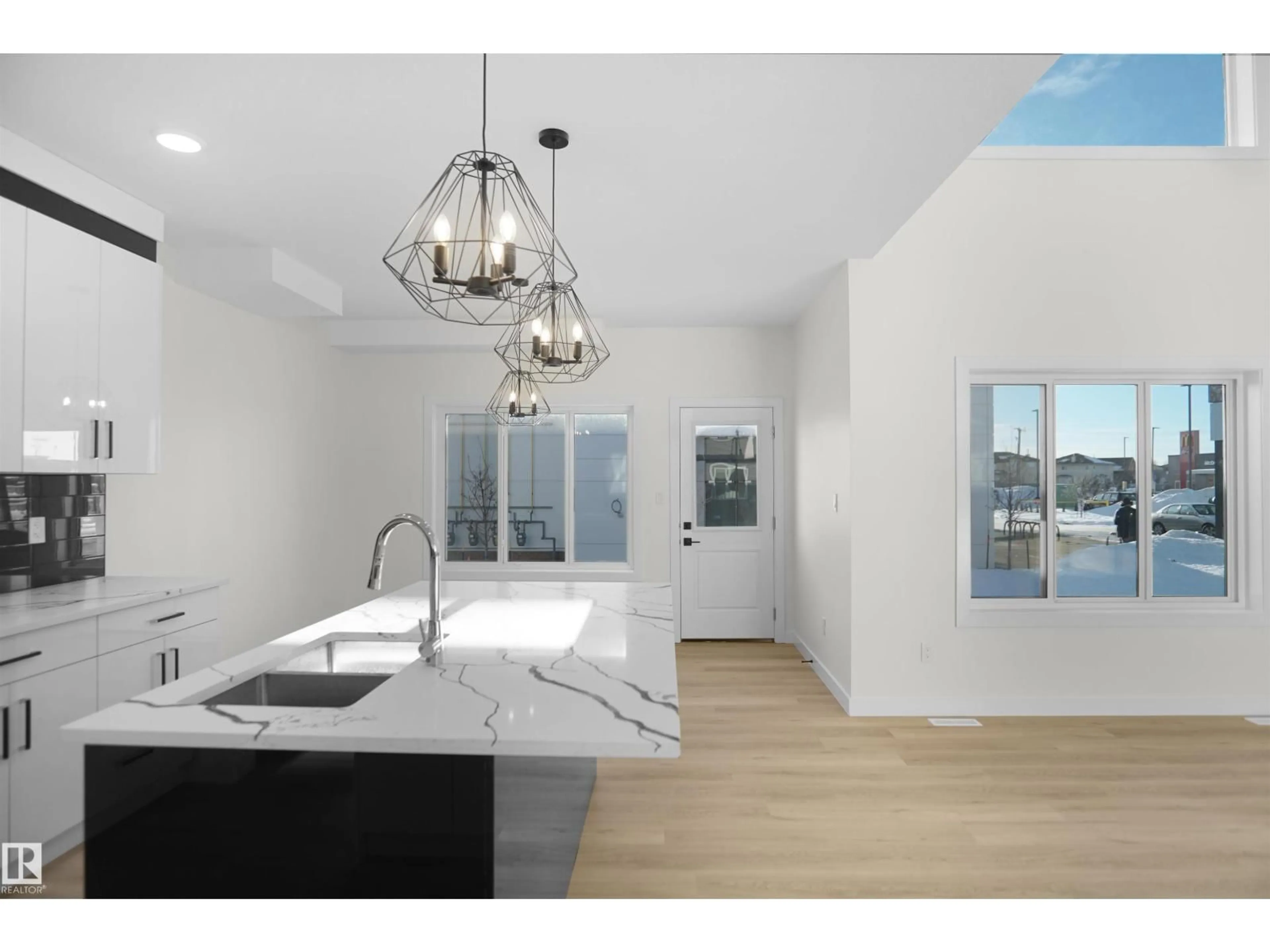 Open concept kitchen, ceramic/tile floor for 6807 169 AV, Edmonton Alberta T5Z0H2