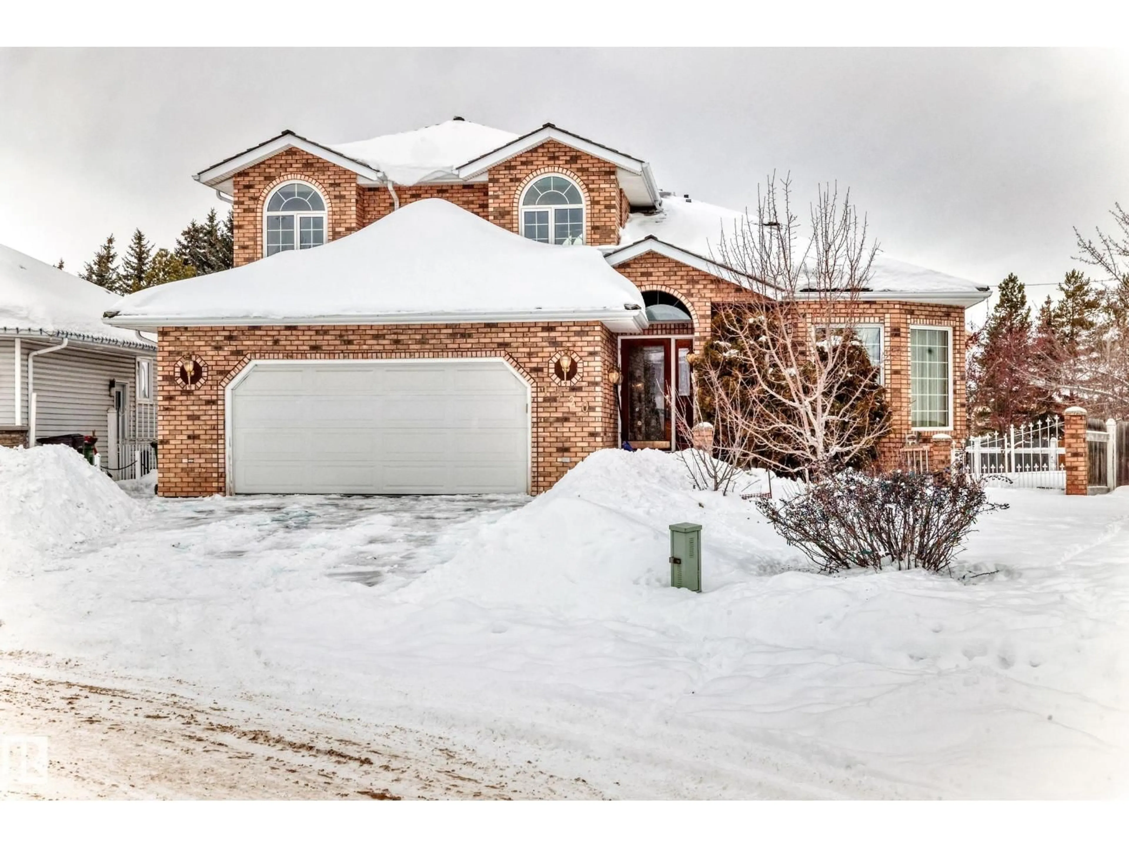 Home with brick exterior material, street for 1720 BEARSPAW DR, Edmonton Alberta T6J5E3