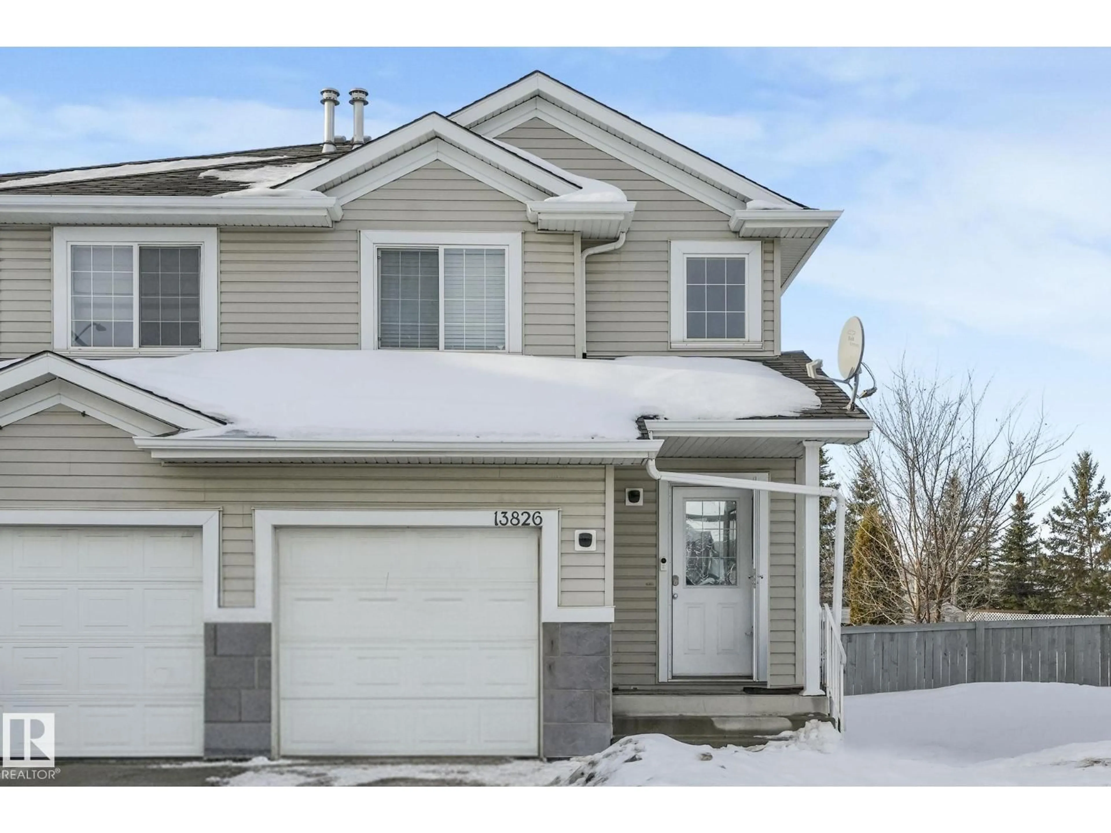 Home with vinyl exterior material, street for NW - 13826 38 ST, Edmonton Alberta T5Y3G6
