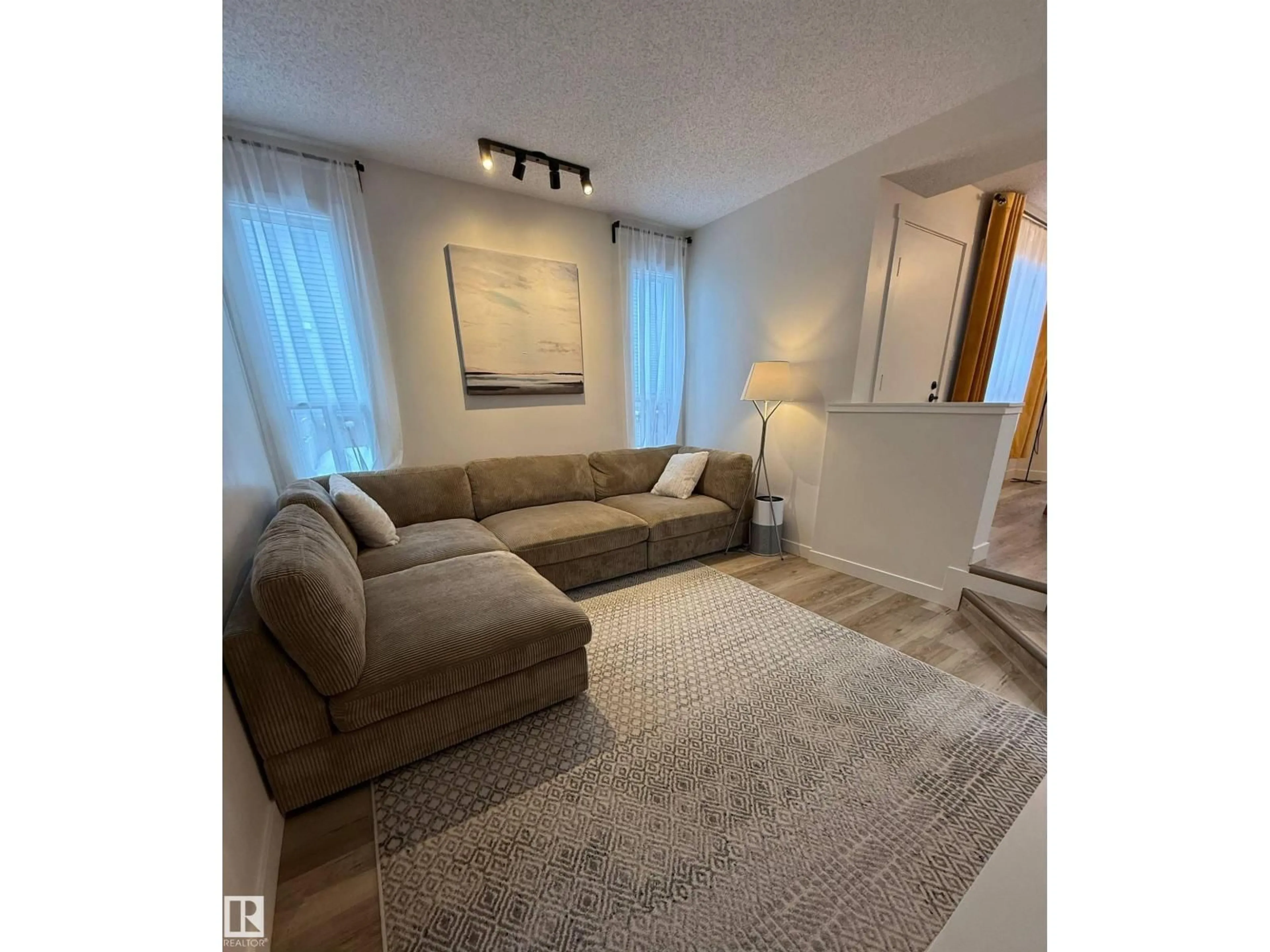 Living room with furniture, unknown for #33 - 4403 RIVERBEND RD, Edmonton Alberta T6H5S9