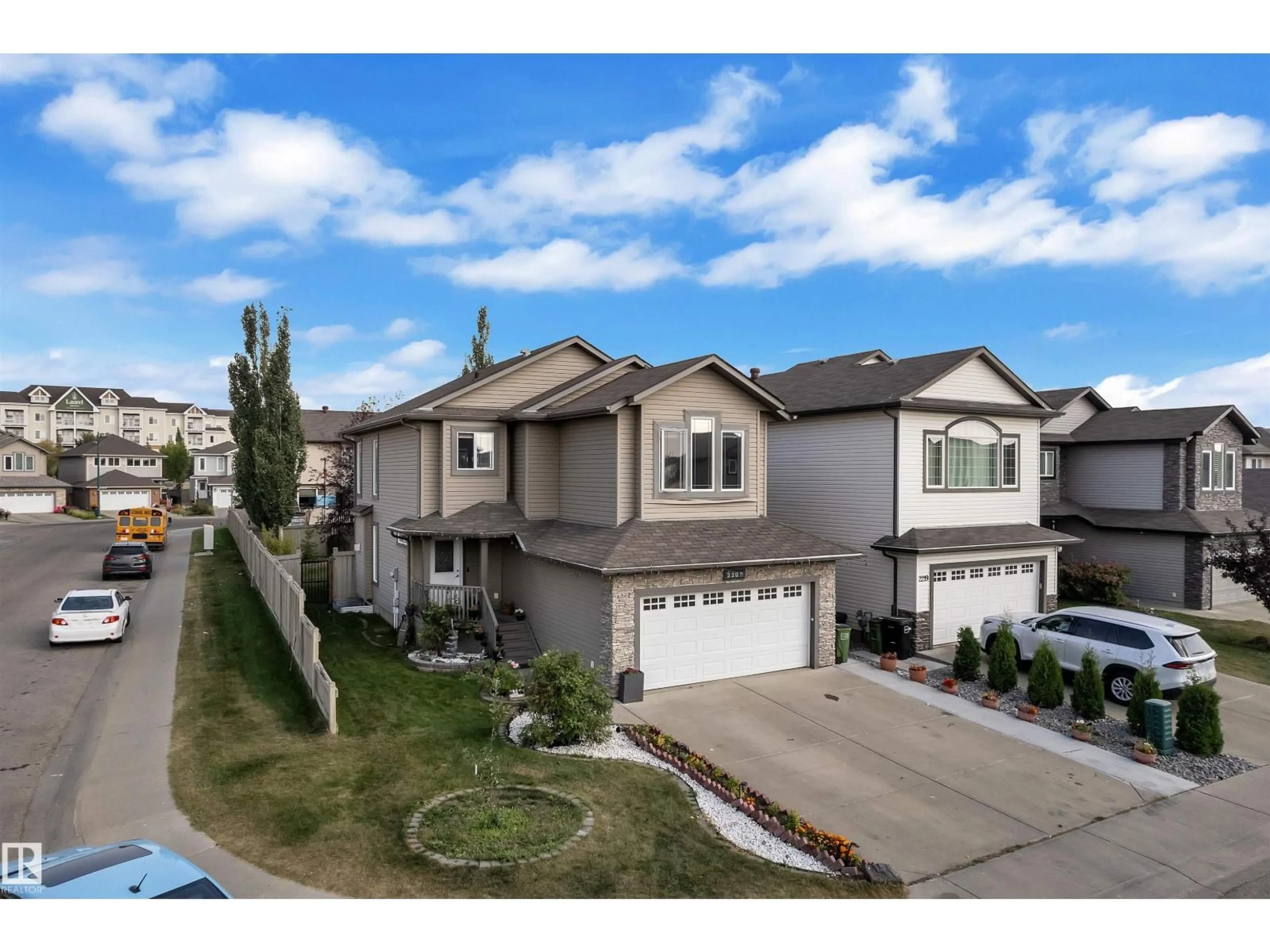 A pic from outside/outdoor area/front of a property/back of a property/a pic from drone, street for NW - 2225 32B ST, Edmonton Alberta T6T0K6