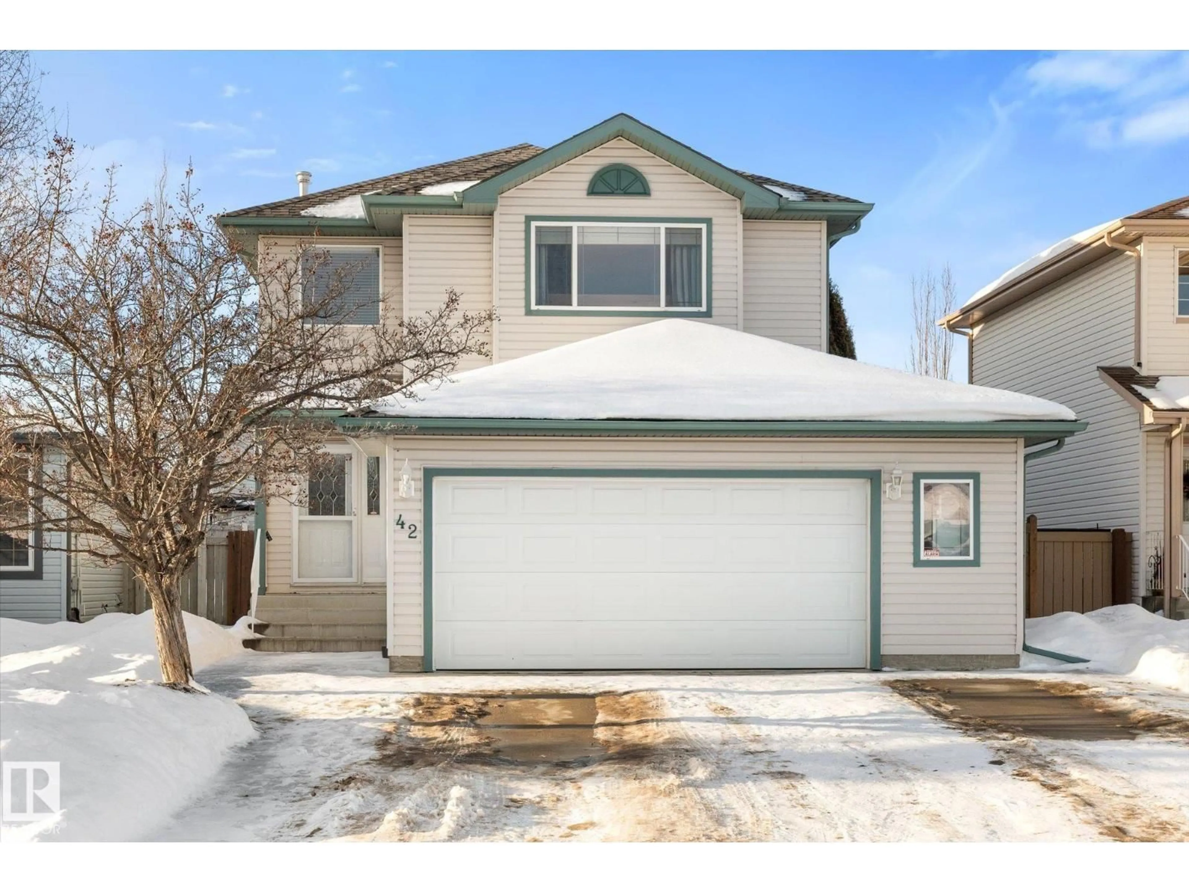 Home with vinyl exterior material, street for 42 BRIARWOOD WY, Stony Plain Alberta T7Z2W4