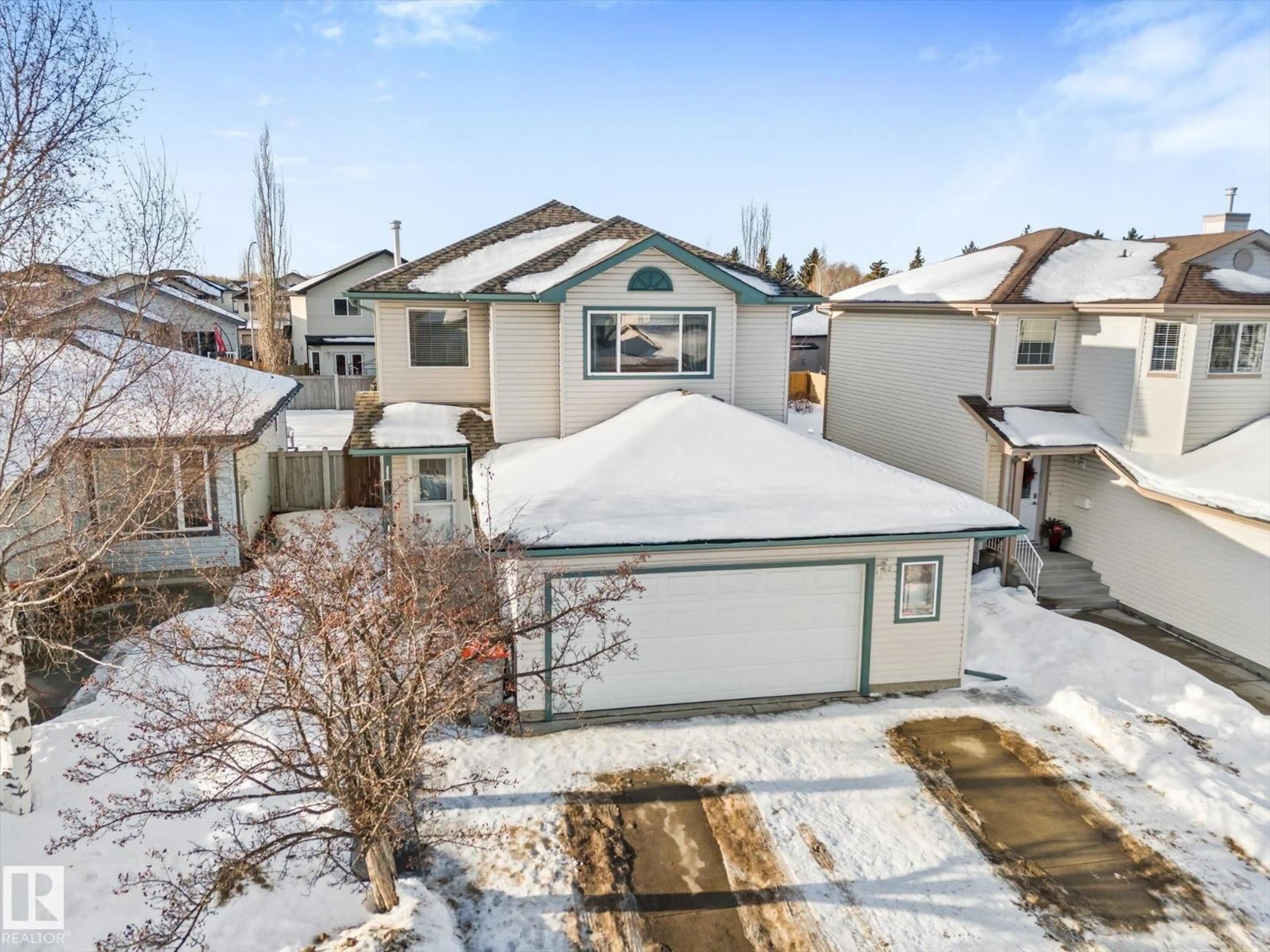 A pic from outside/outdoor area/front of a property/back of a property/a pic from drone, street for 42 BRIARWOOD WY, Stony Plain Alberta T7Z2W4