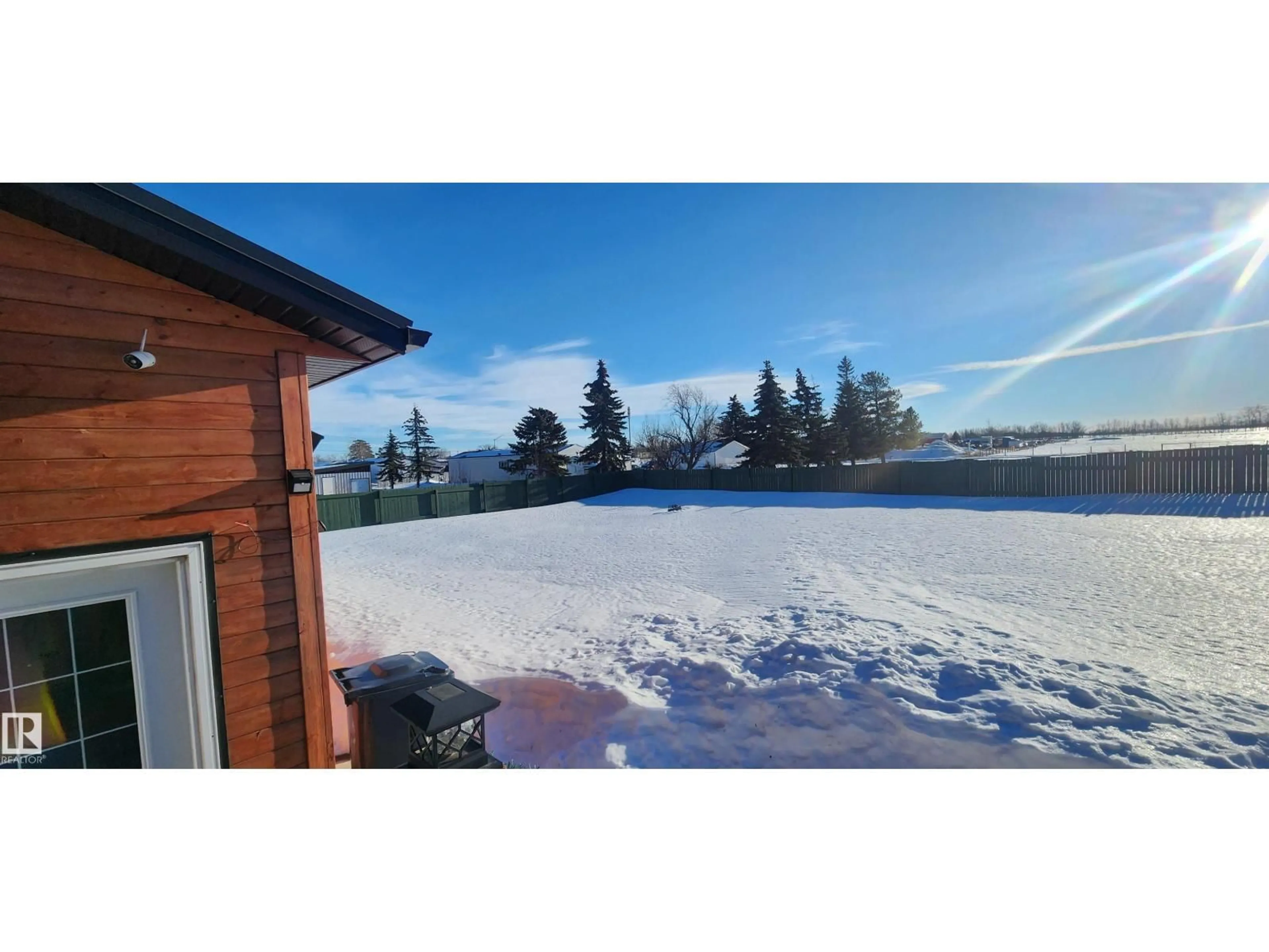 A pic from outside/outdoor area/front of a property/back of a property/a pic from drone, water/lake/river/ocean view for 5216 53 AV, Clyde Alberta T0G0P0