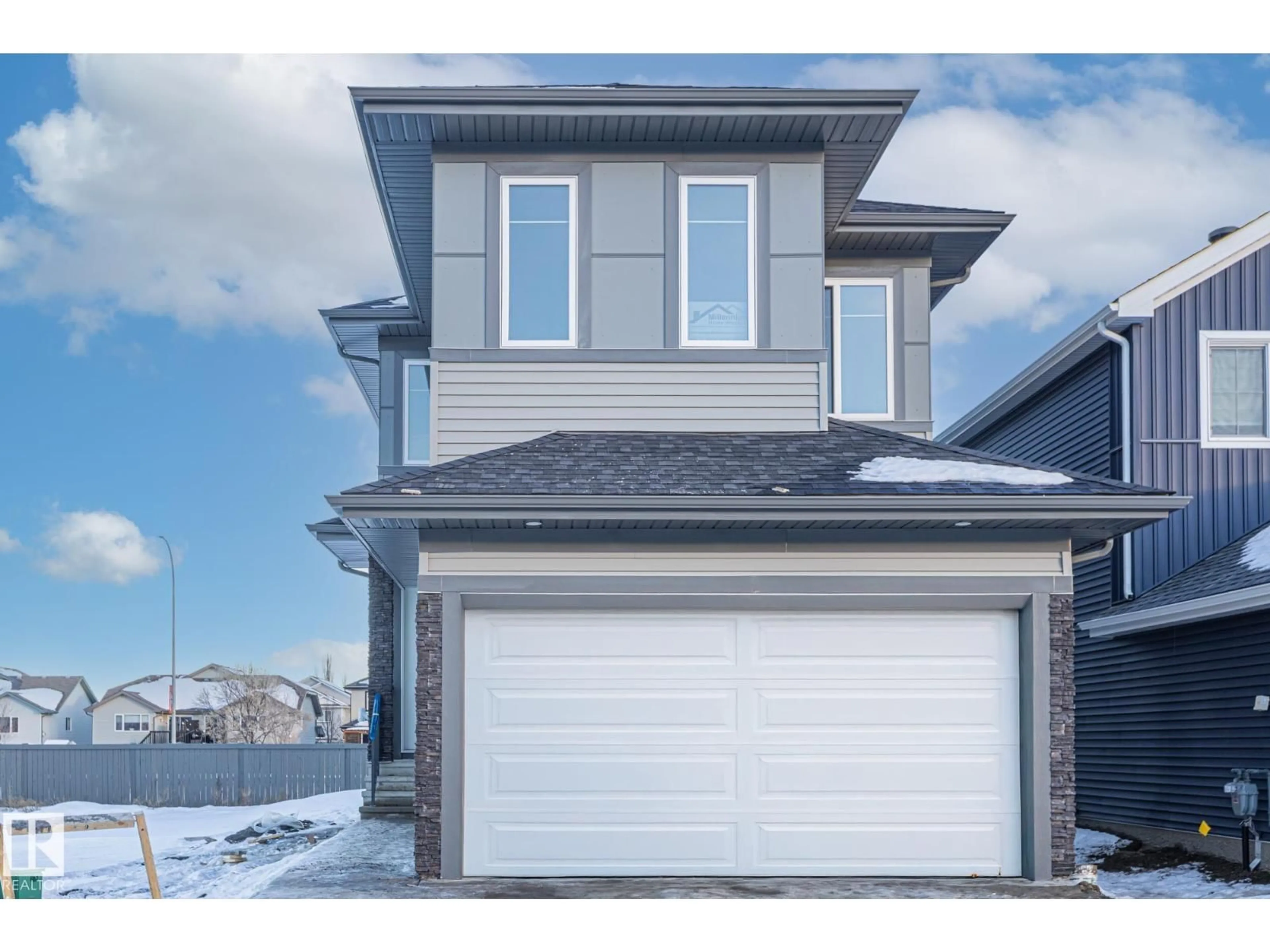 Home with vinyl exterior material, street for 89 ELLIOTT WD, Fort Saskatchewan Alberta T8L1R8
