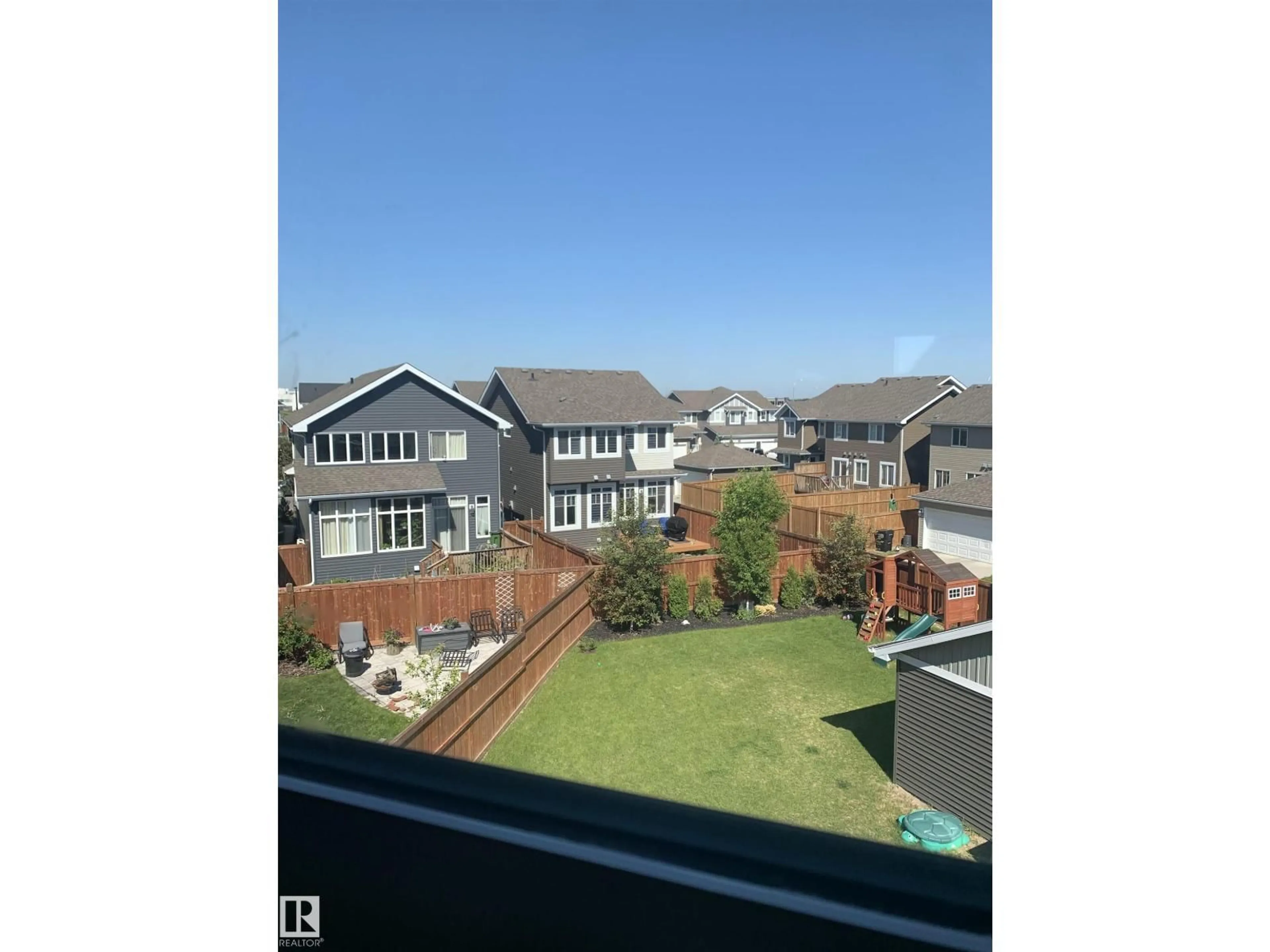 A pic from outside/outdoor area/front of a property/back of a property/a pic from drone, city buildings view from balcony for 16752 15 AV, Edmonton Alberta T6W3R6