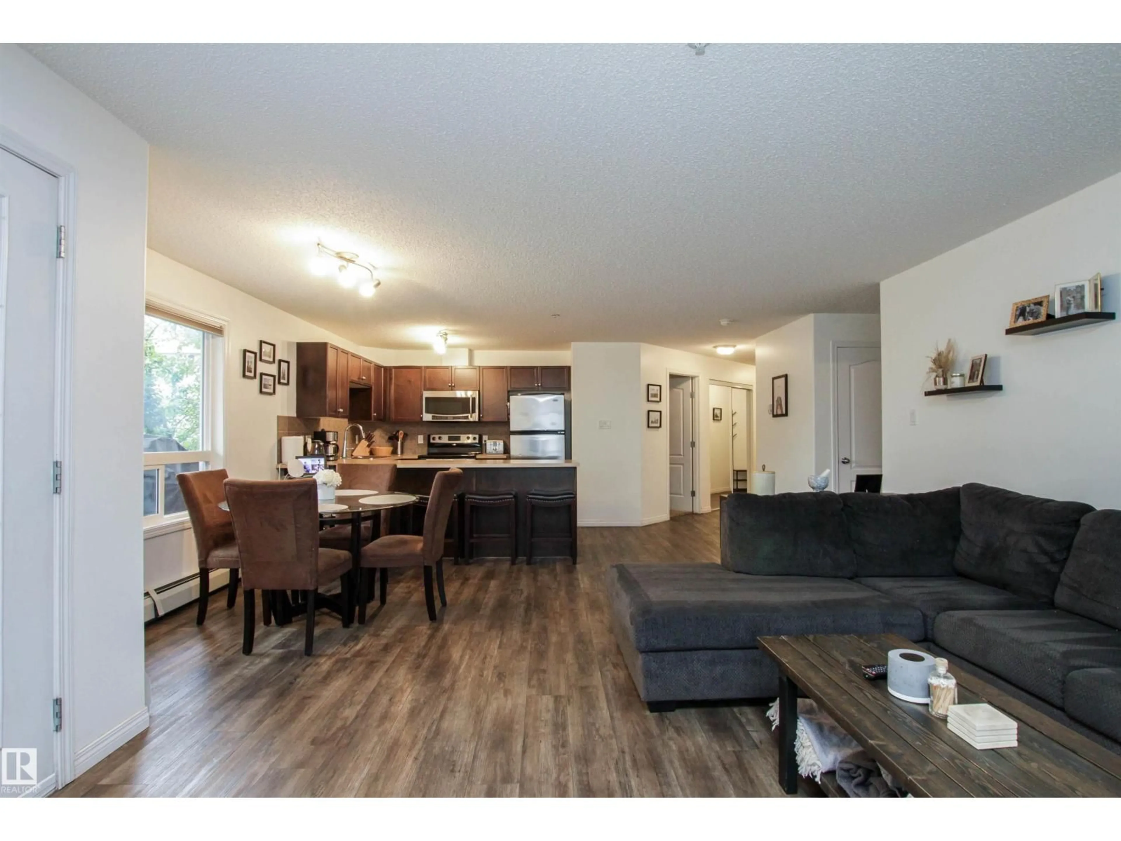 Open concept kitchen, wood/laminate floor for 7327 - 7208 SOUTH TERWILLEGAR DR, Edmonton Alberta T6R0L8