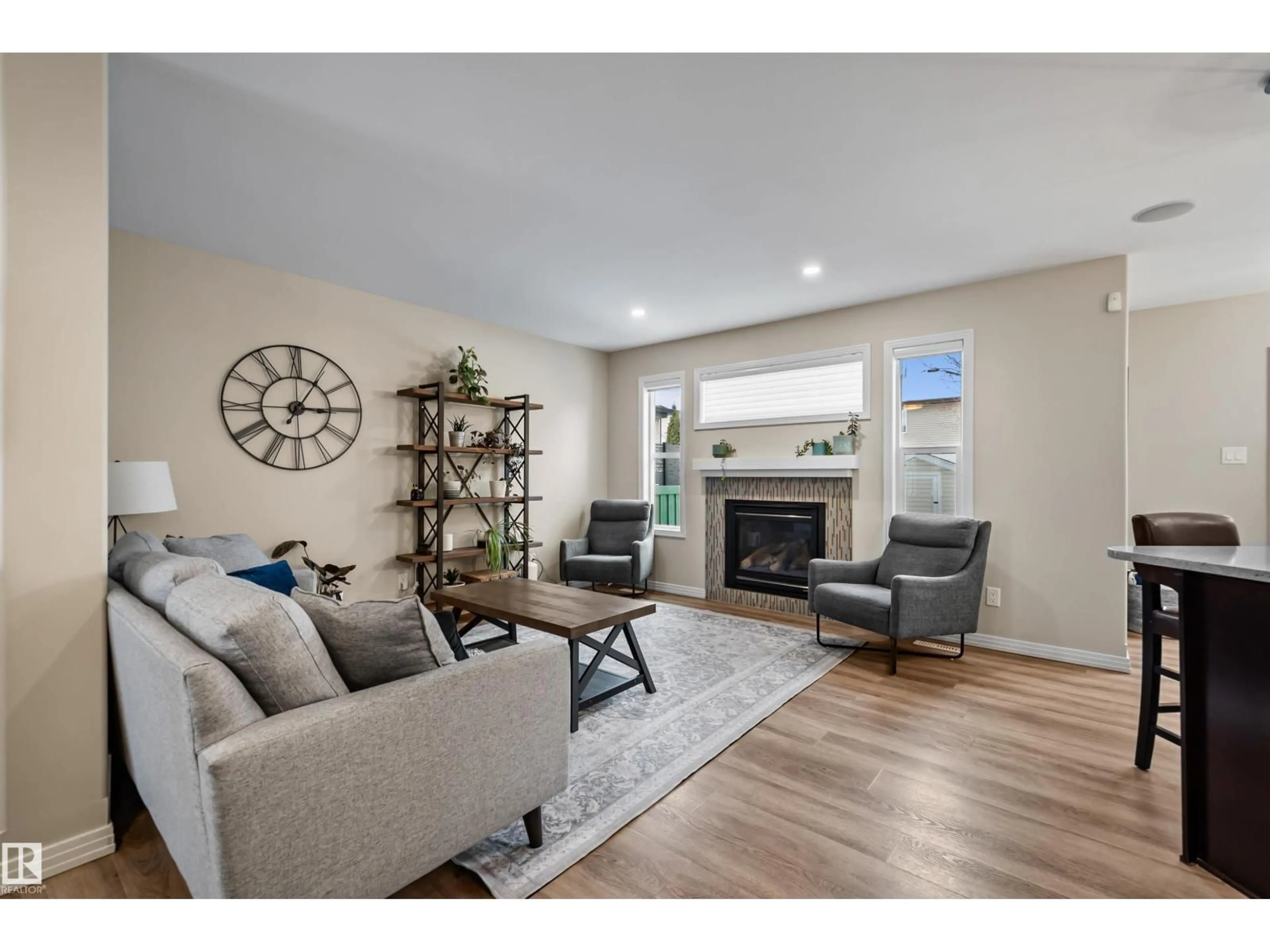 Living room with furniture, wood/laminate floor for NW - 2349 HAGEN LINK LI, Edmonton Alberta T6R0B2