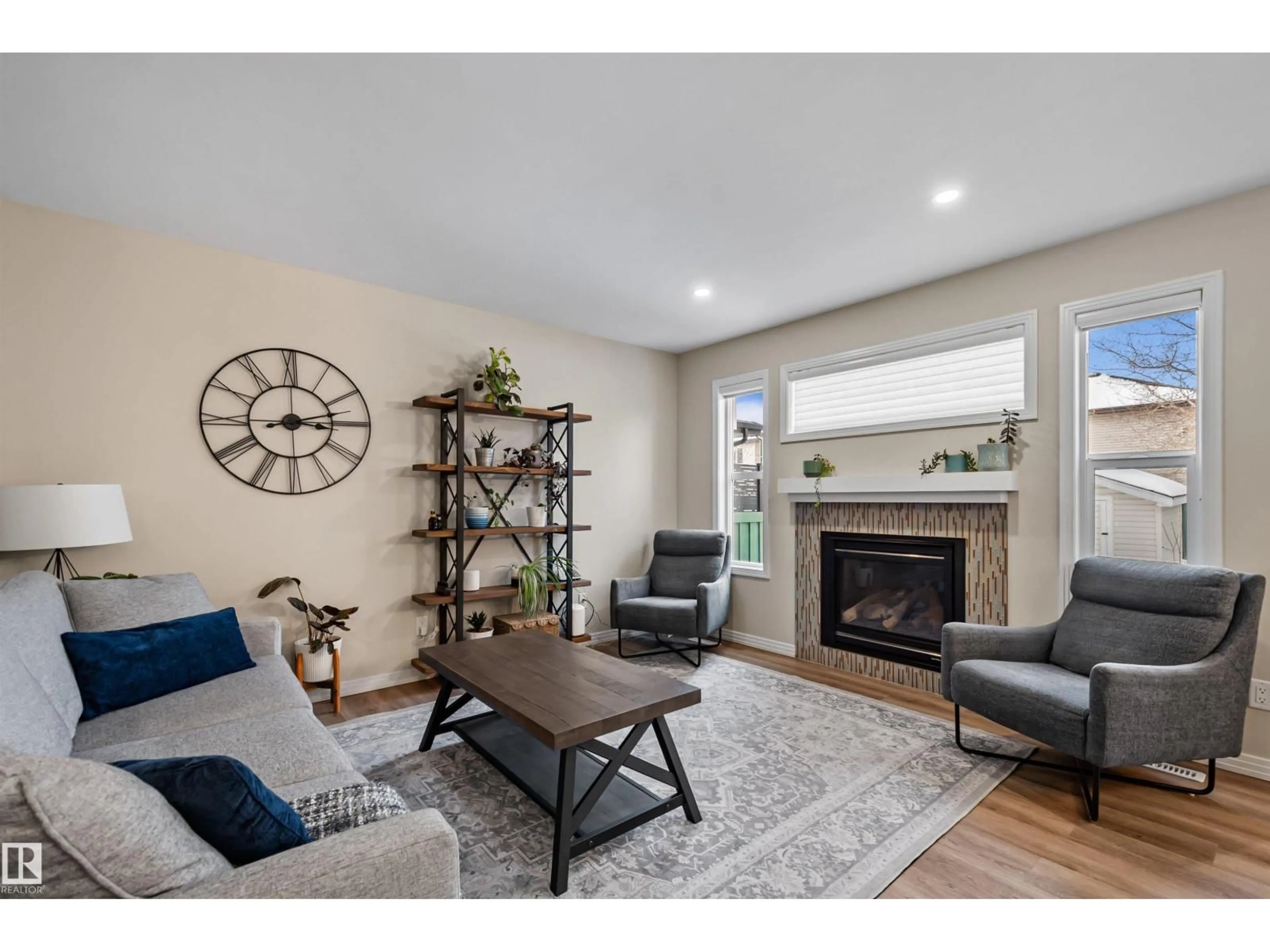 Living room with furniture, wood/laminate floor for NW - 2349 HAGEN LINK LI, Edmonton Alberta T6R0B2