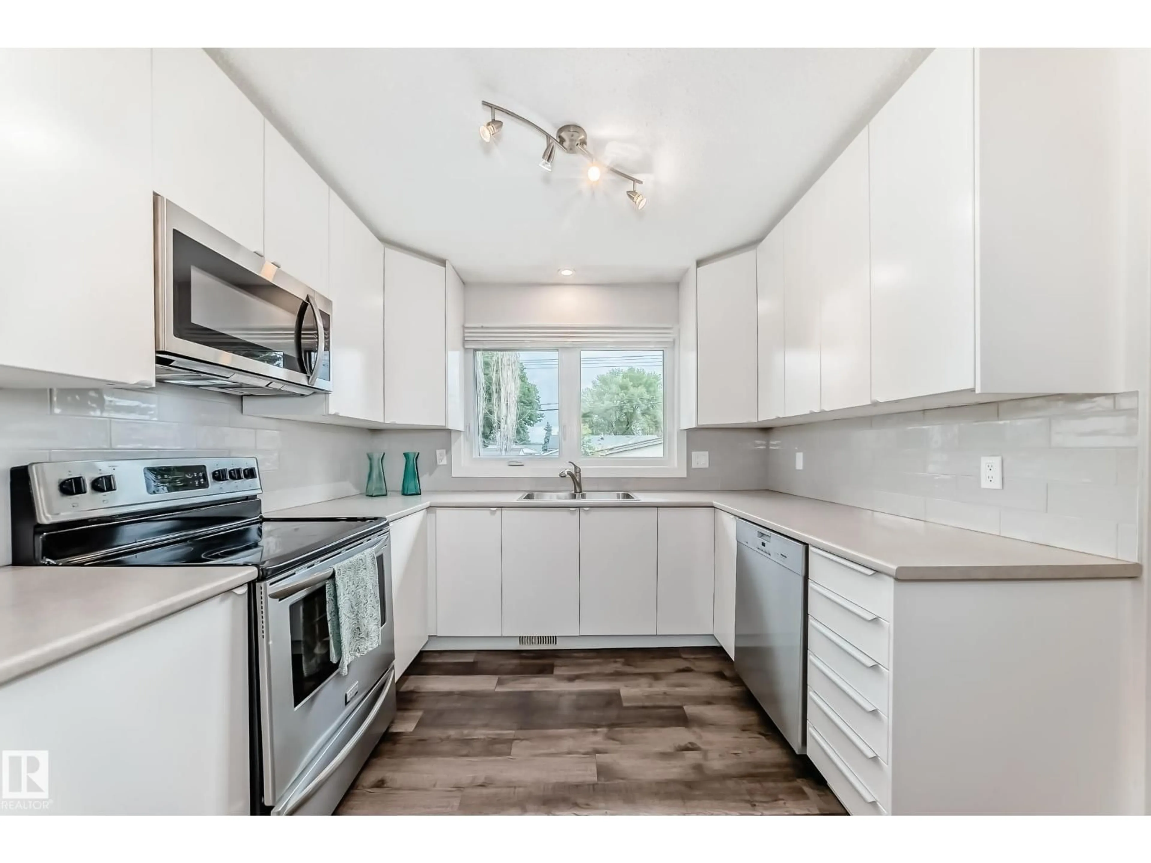 Open concept kitchen, unknown for NW - 8415 72 ST, Edmonton Alberta T6B1Y3