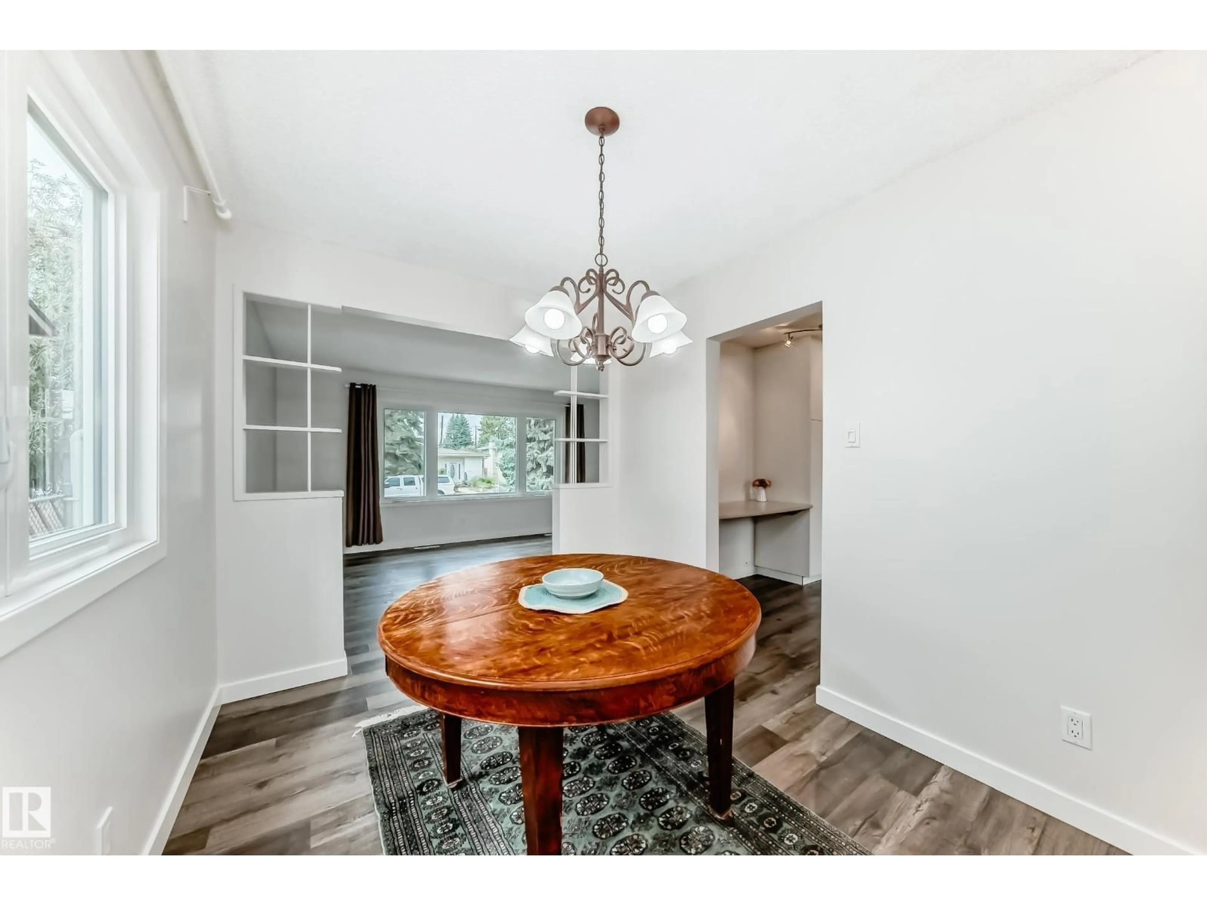 Dining room, wood/laminate floor for NW - 8415 72 ST, Edmonton Alberta T6B1Y3