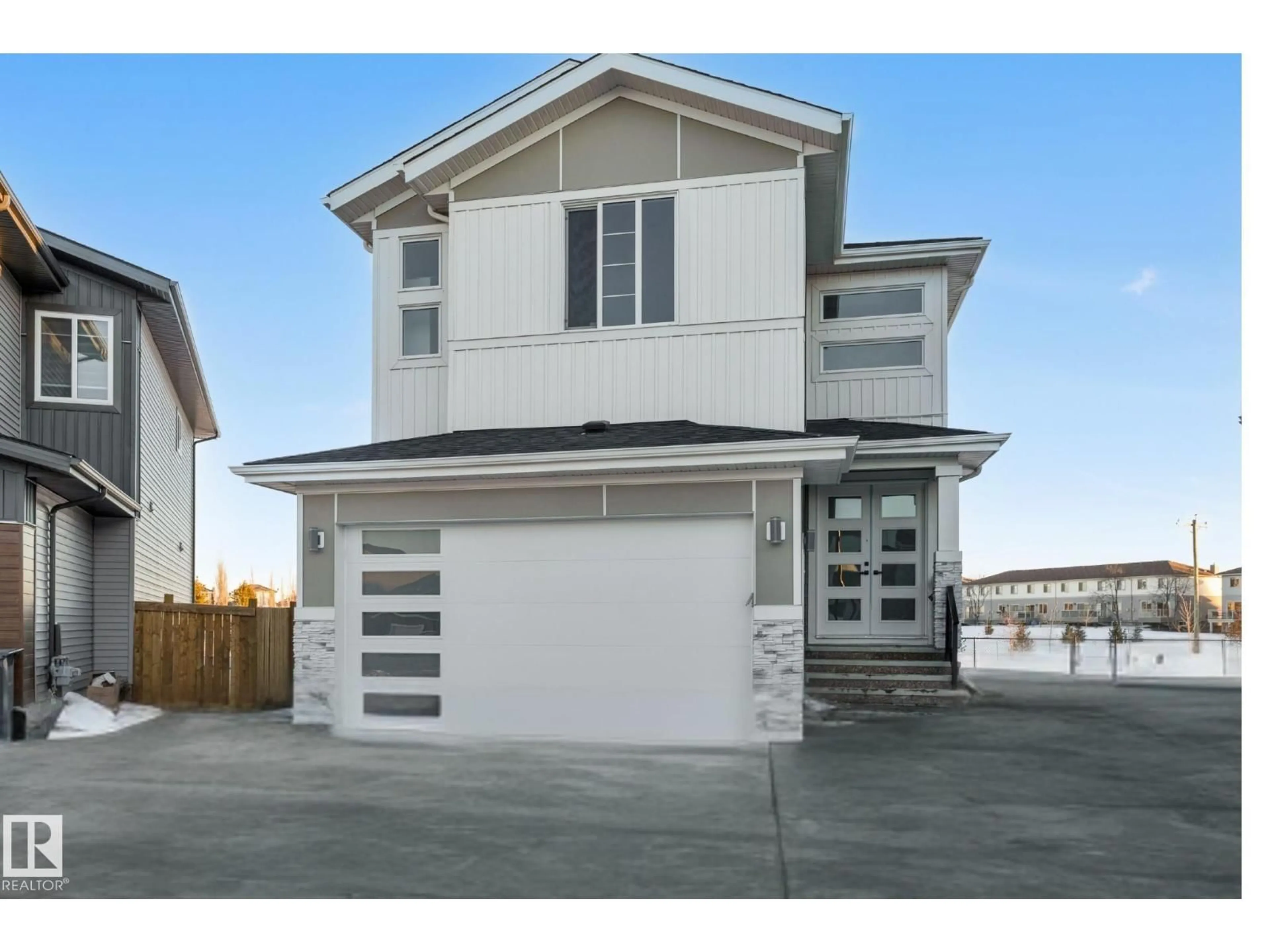 Home with vinyl exterior material, street for 150 CREEKSIDE LN, Leduc Alberta T9E1T1