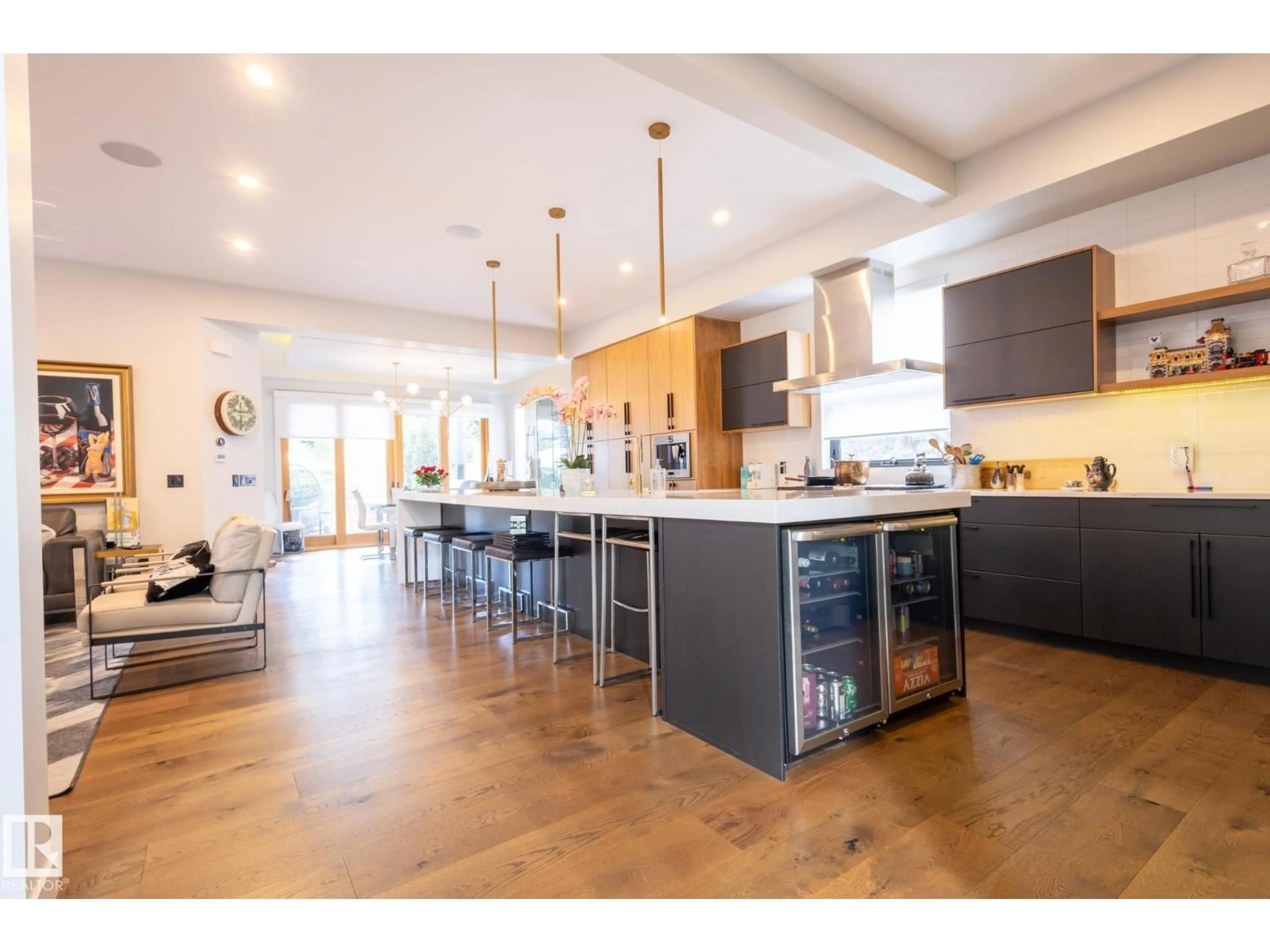 Open concept kitchen, wood/laminate floor for 14027 91A AV, Edmonton Alberta T5R5A8