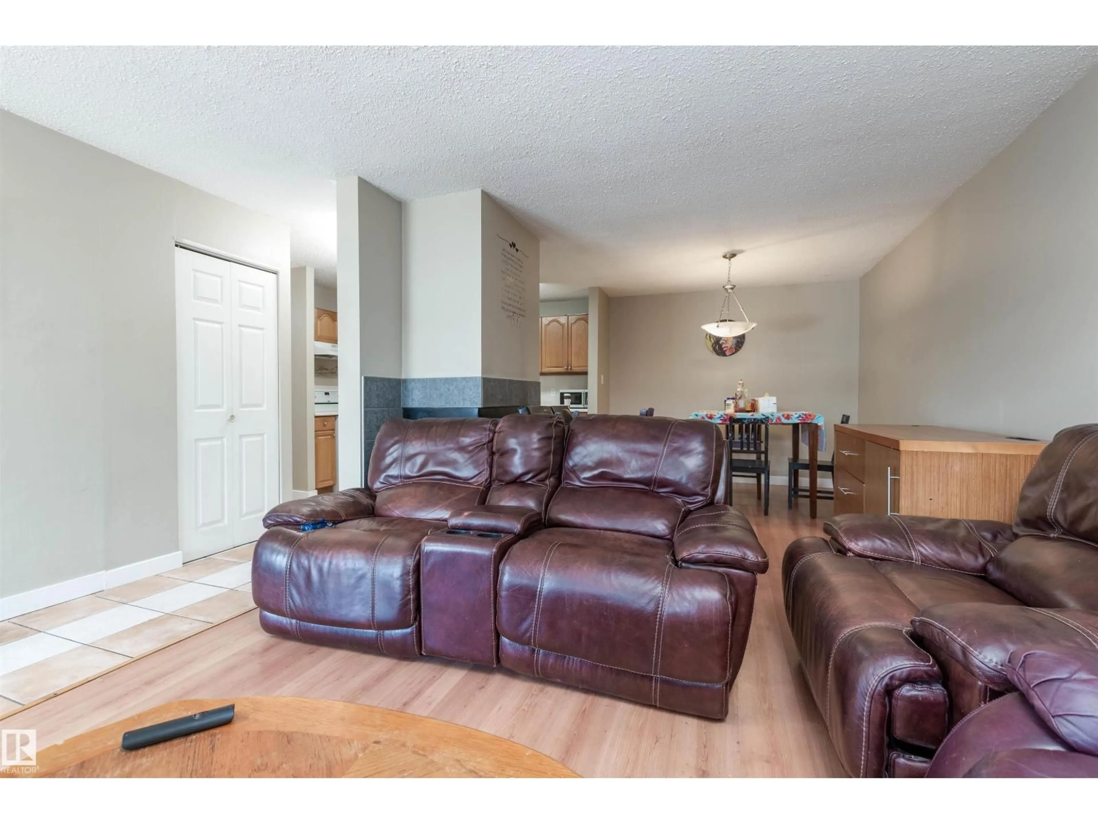 Living room with furniture, wood/laminate floor for 2031 SADDLEBACK RD, Edmonton Alberta T6J4T4