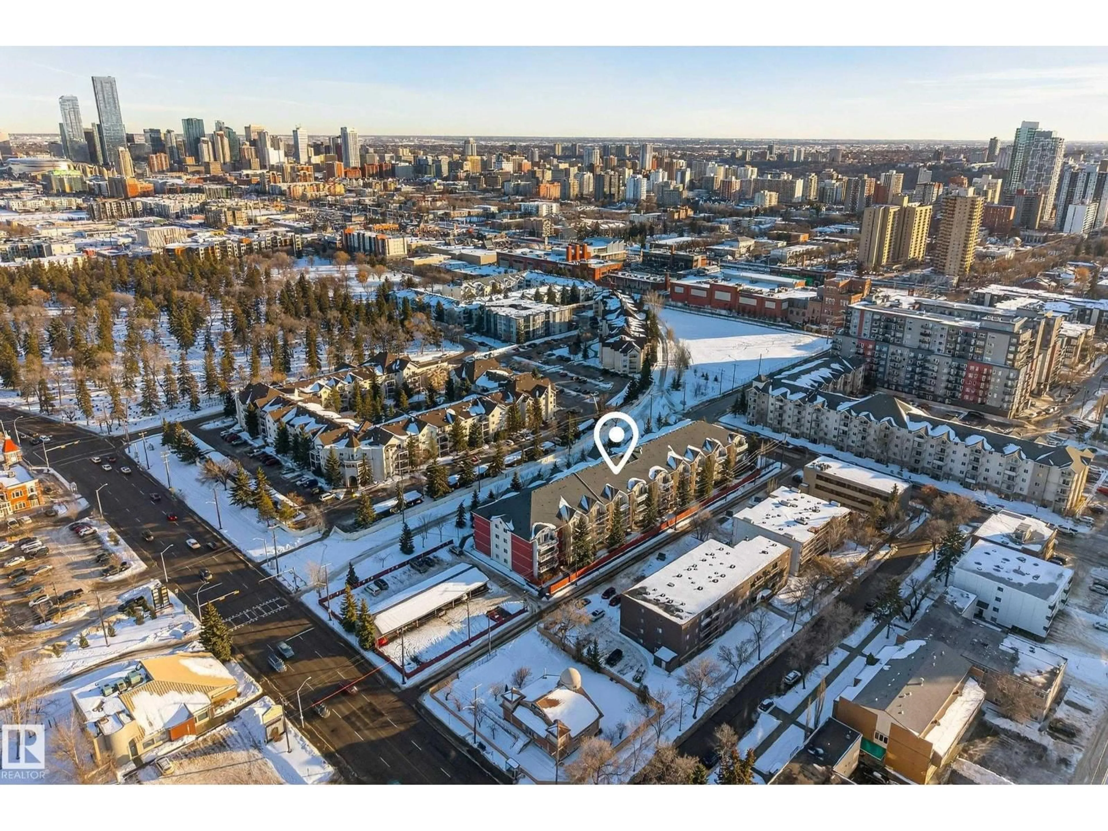 A pic from outside/outdoor area/front of a property/back of a property/a pic from drone, street for #101 - 12110 106 AV, Edmonton Alberta T5N4R9