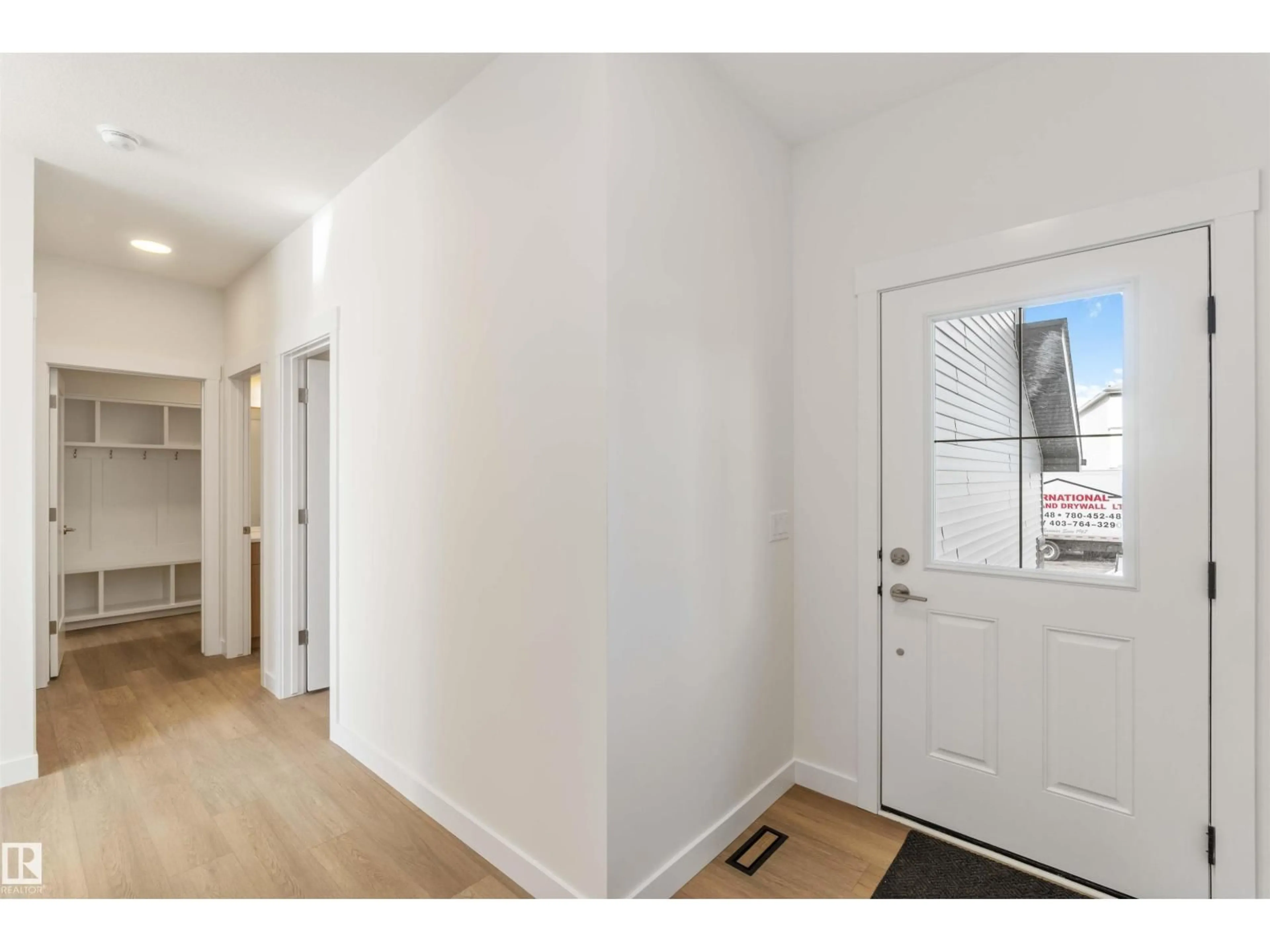 Indoor entryway for 2215 4 AV, Edmonton Alberta T6X3L4