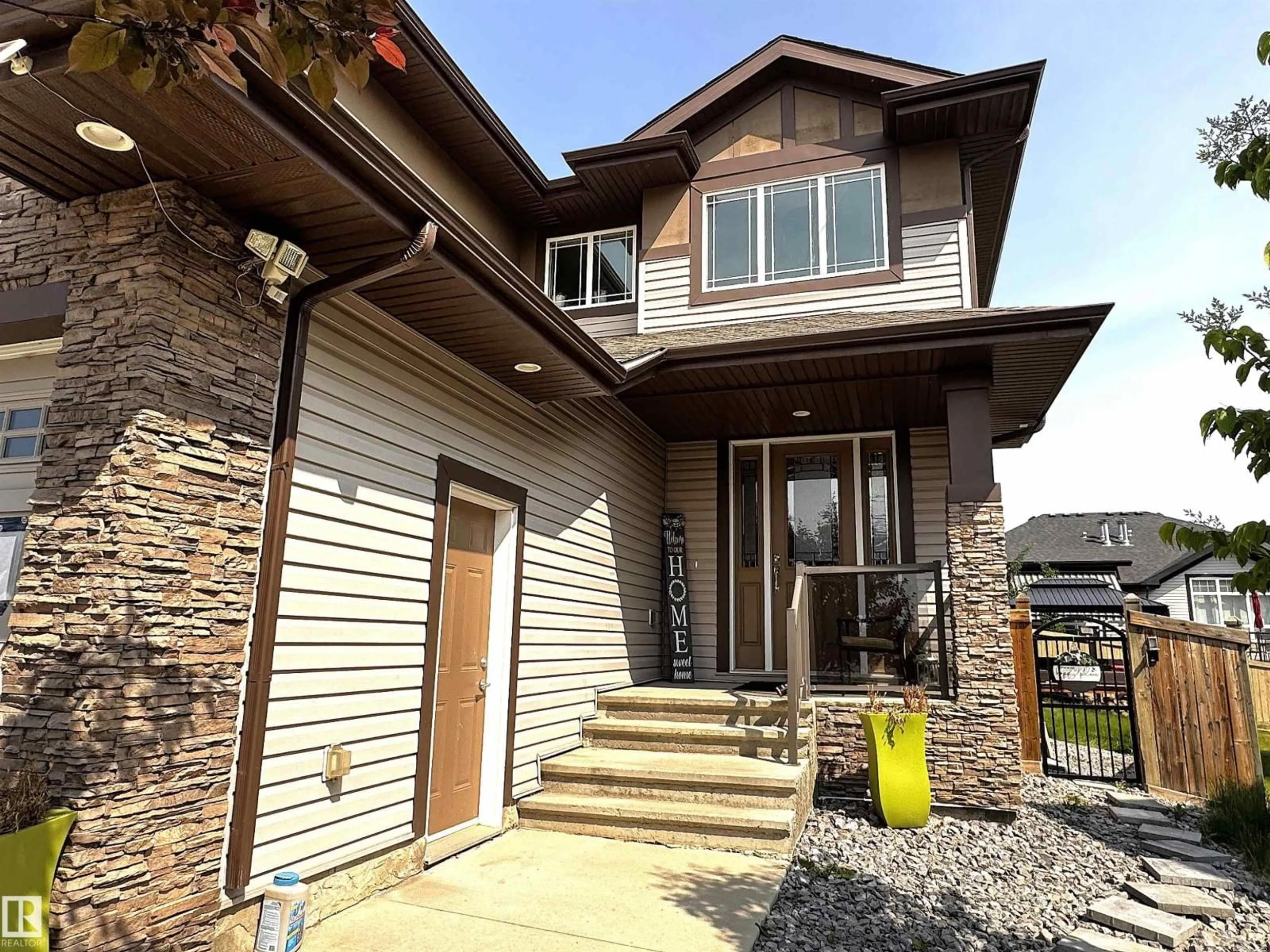 Home with brick exterior material, street for 2410 ASHCRAFT CR, Edmonton Alberta T6W2N1