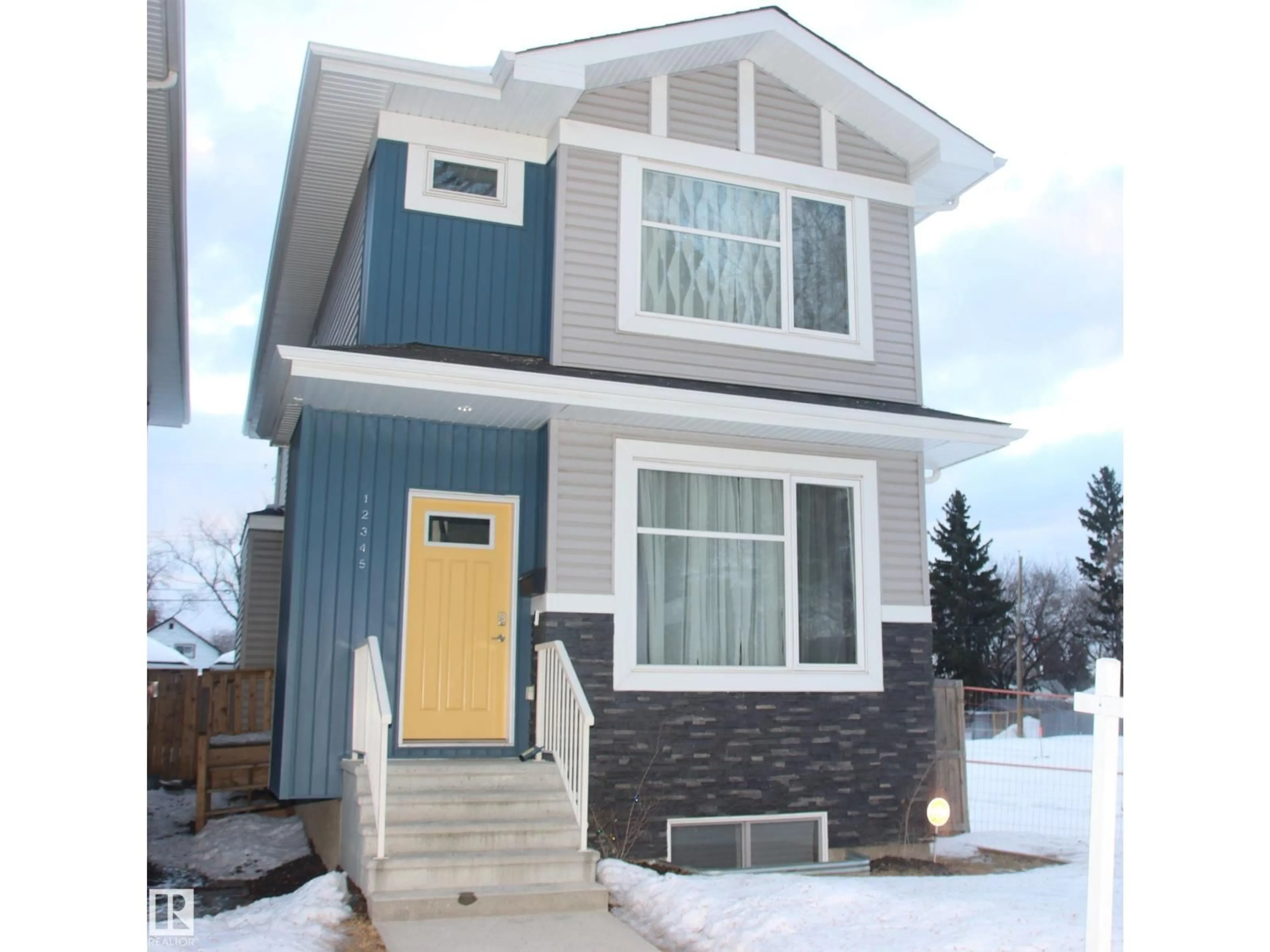 Home with vinyl exterior material, street for NW - 12345 85 ST, Edmonton Alberta T5B3H1
