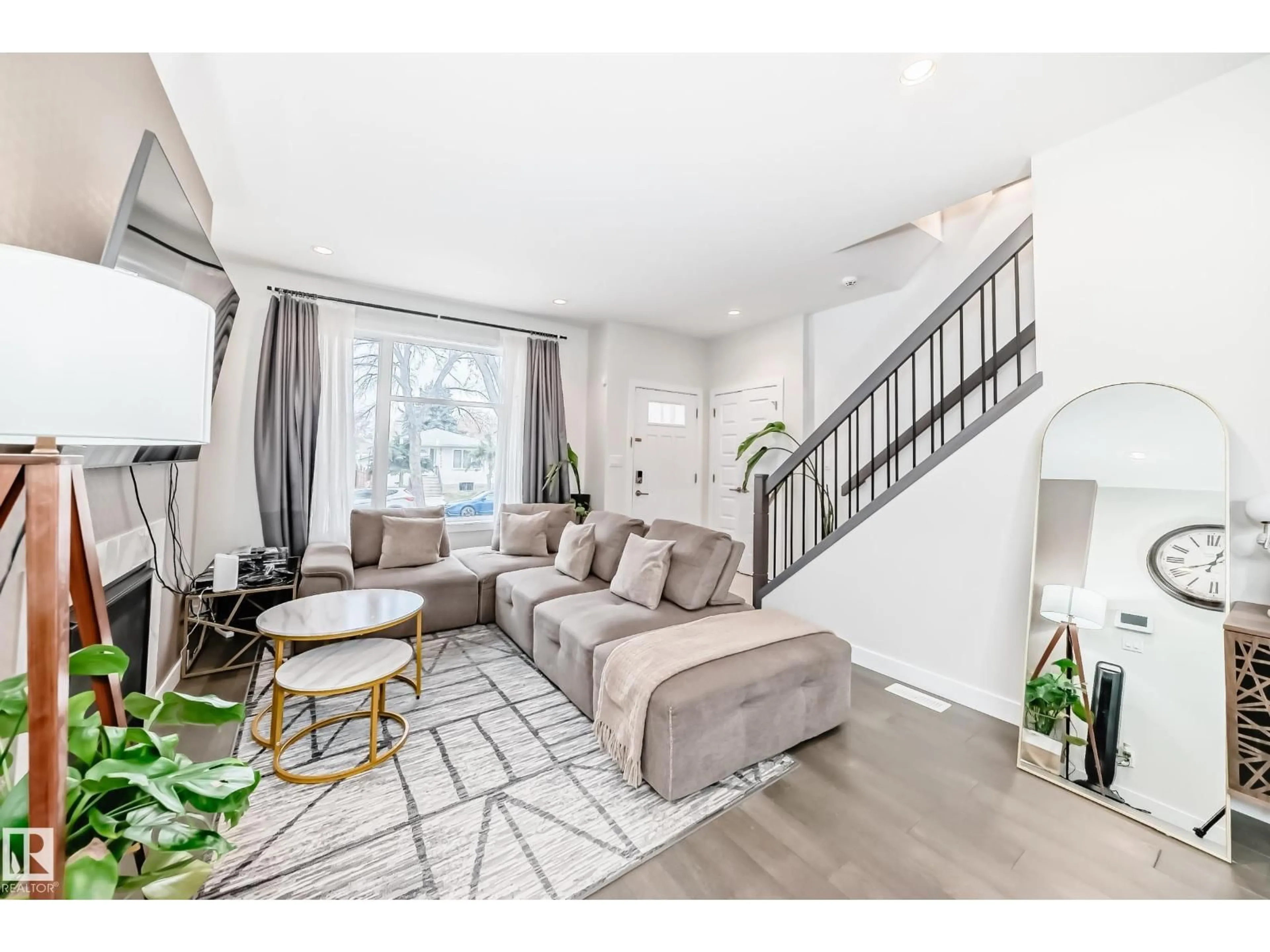 Living room with furniture, wood/laminate floor for NW - 12345 85 ST, Edmonton Alberta T5B3H1