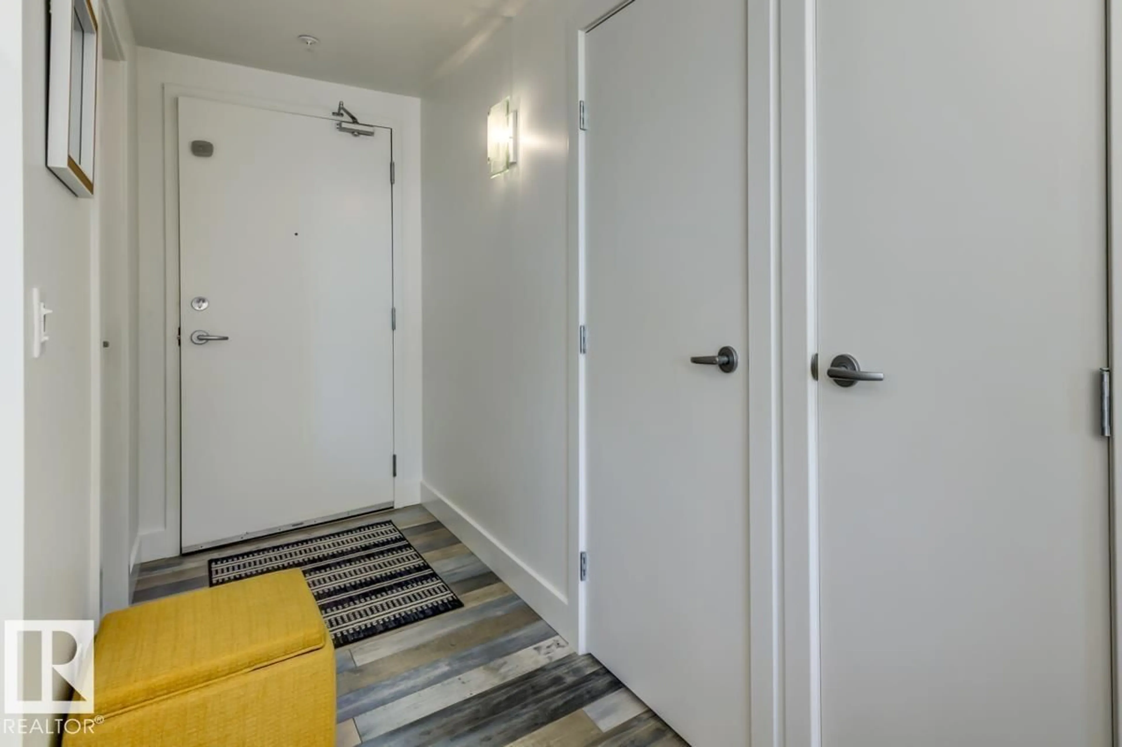 Indoor entryway for 11933 - 205 JASPER AV NW, Edmonton Alberta T5K0P1