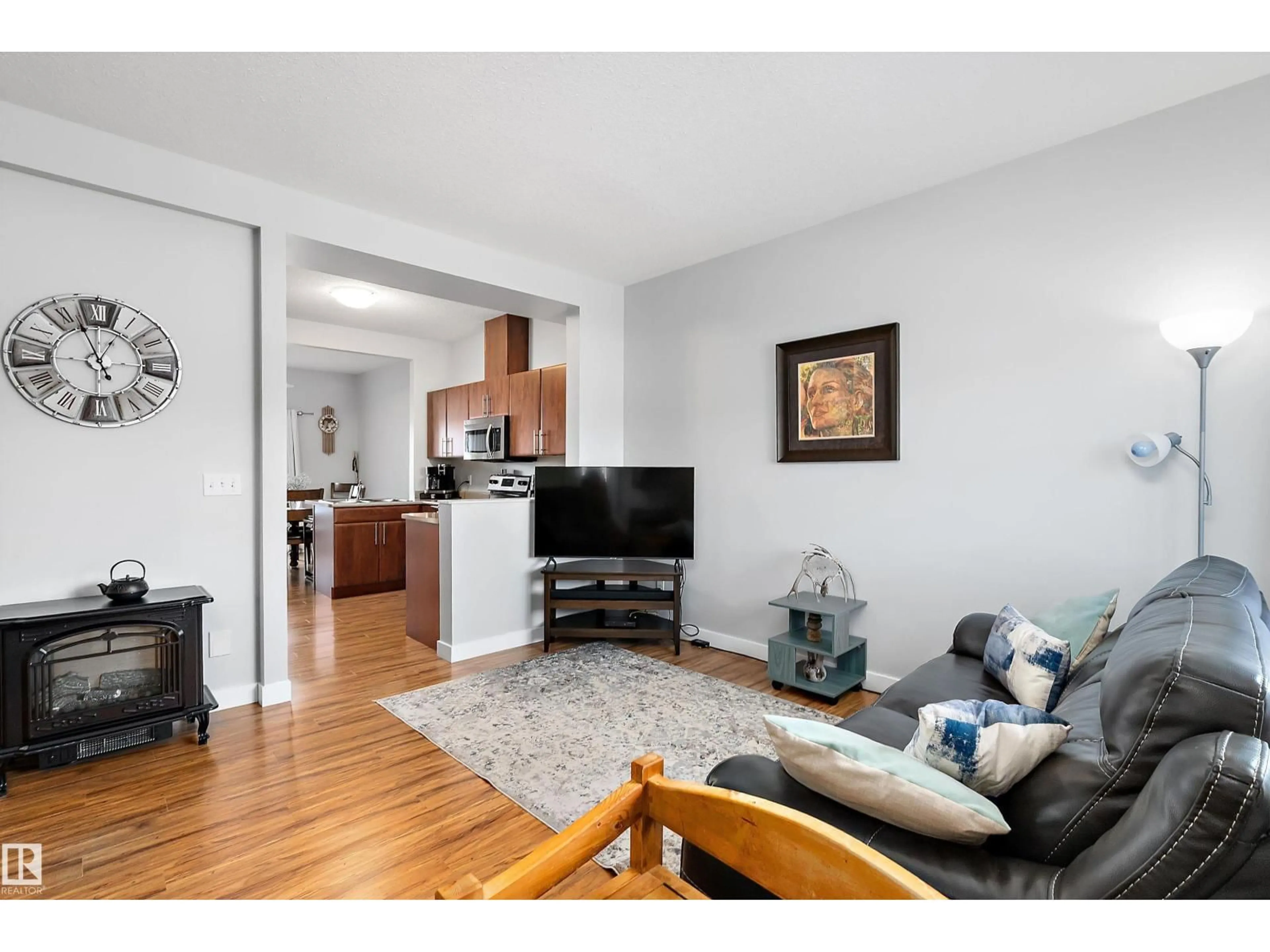 Living room with furniture, wood/laminate floor for #2 - 300 QUEEN ST, Spruce Grove Alberta T7X2J1