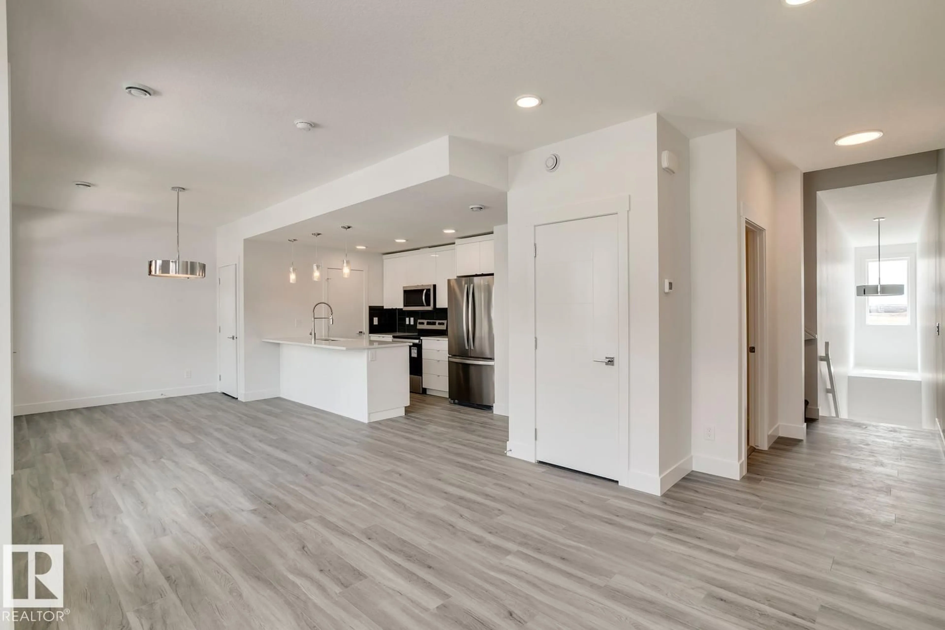 Open concept kitchen, unknown for #40 - 16231 19 AV, Edmonton Alberta T6W5C6