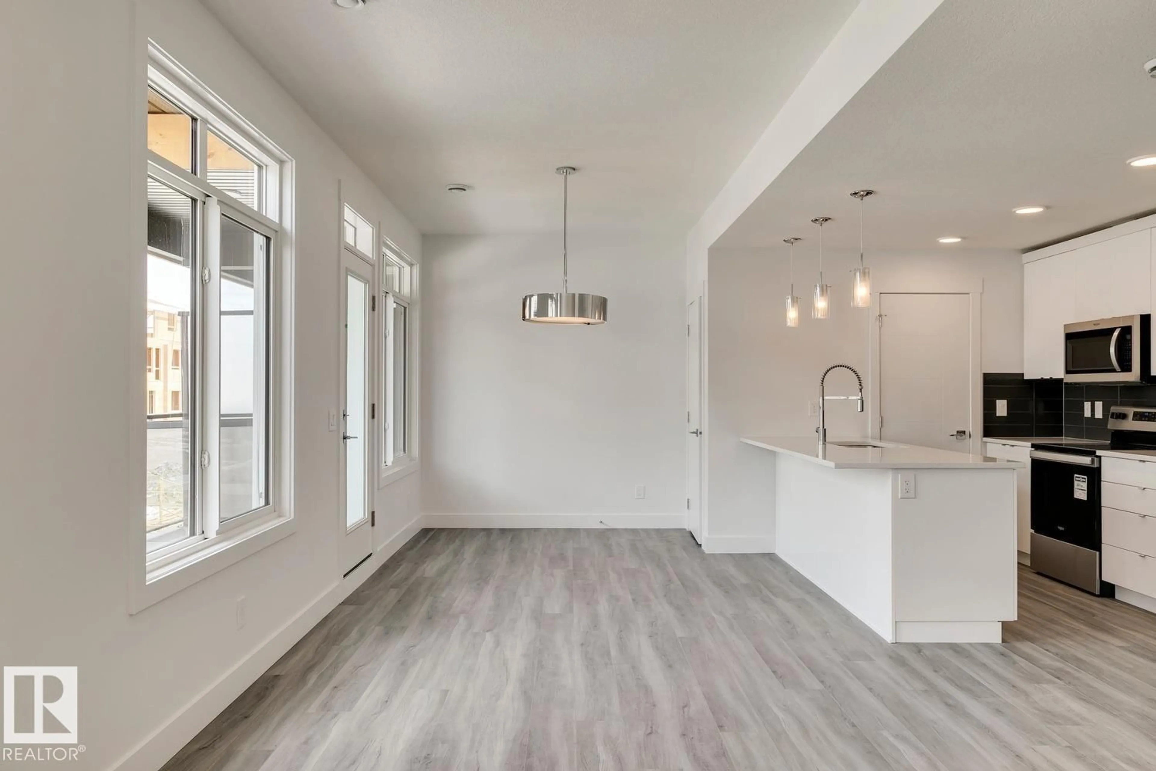 Open concept kitchen, unknown for #40 - 16231 19 AV, Edmonton Alberta T6W5C6