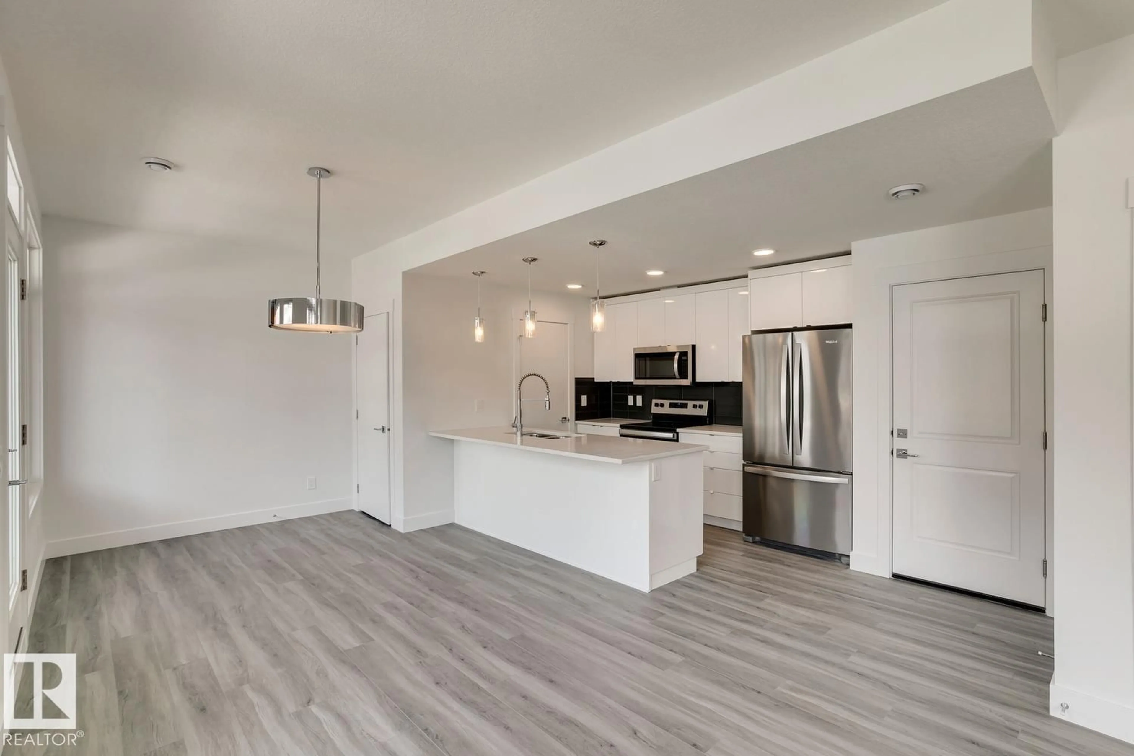 Open concept kitchen, unknown for #40 - 16231 19 AV, Edmonton Alberta T6W5C6