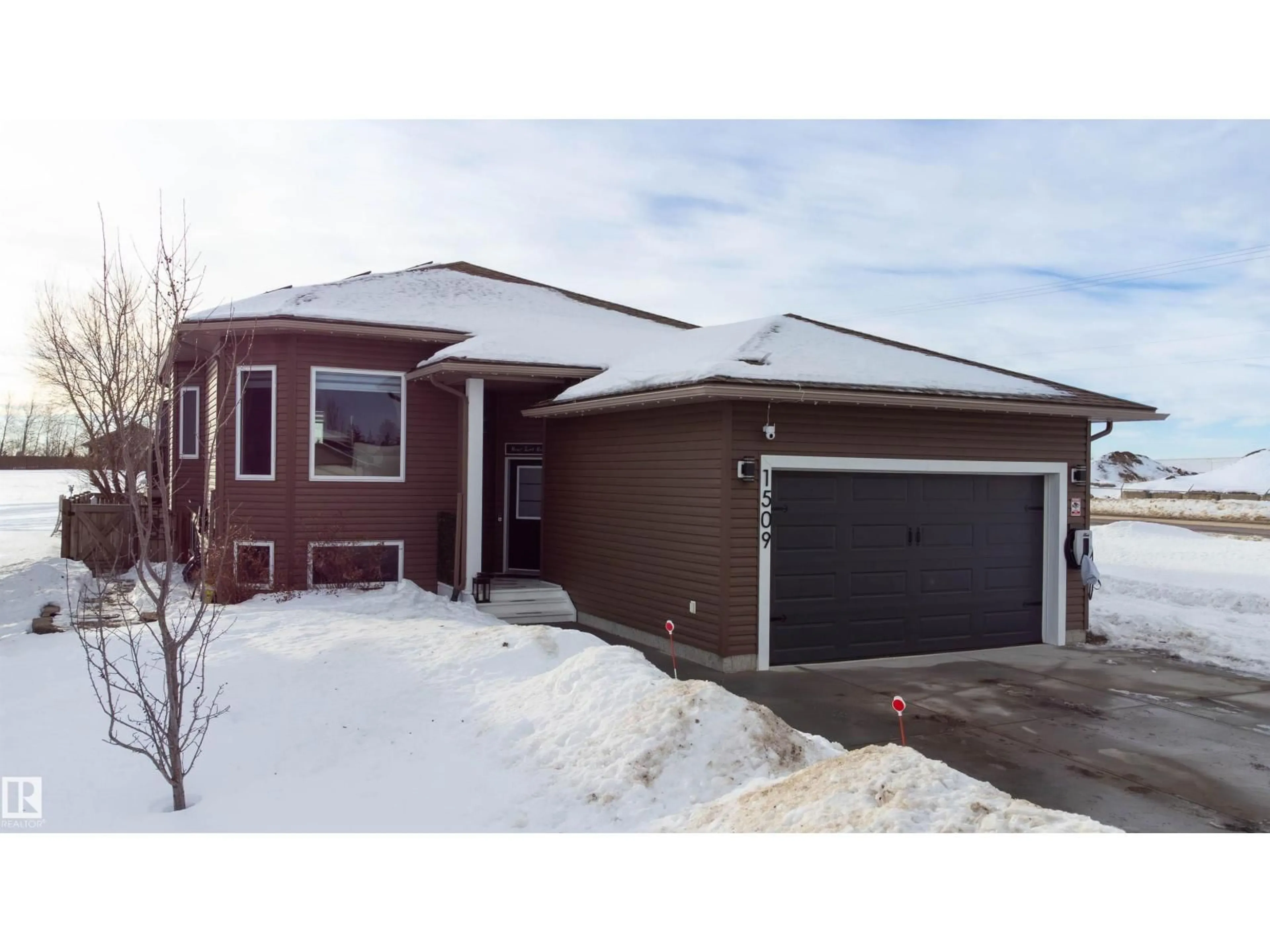 Home with brick exterior material, street for 1509 14 AV, Cold Lake Alberta T9M1Z8
