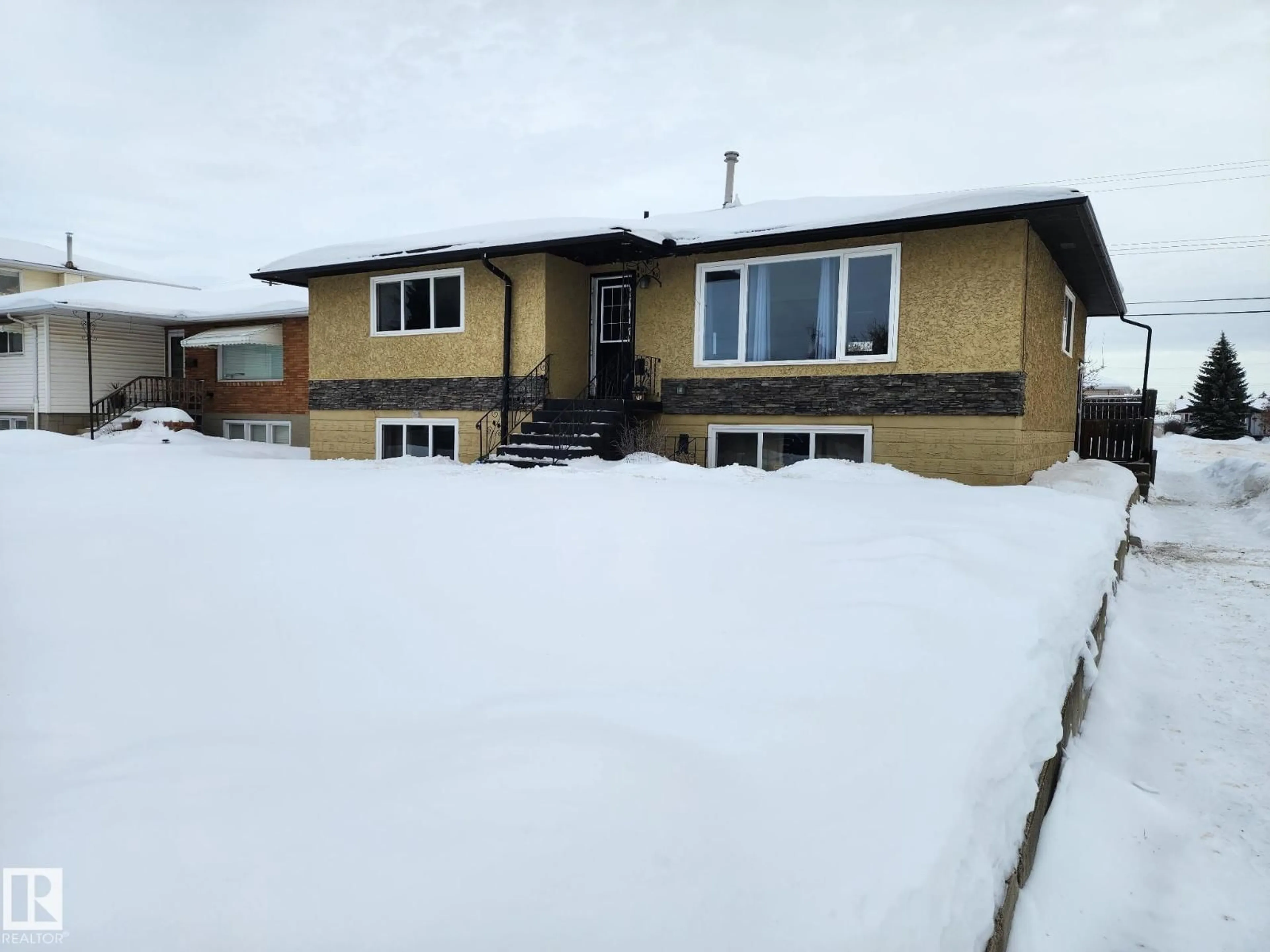 A pic from outside/outdoor area/front of a property/back of a property/a pic from drone, street for NW - 12903/12905 96 ST, Edmonton Alberta T5E4B2