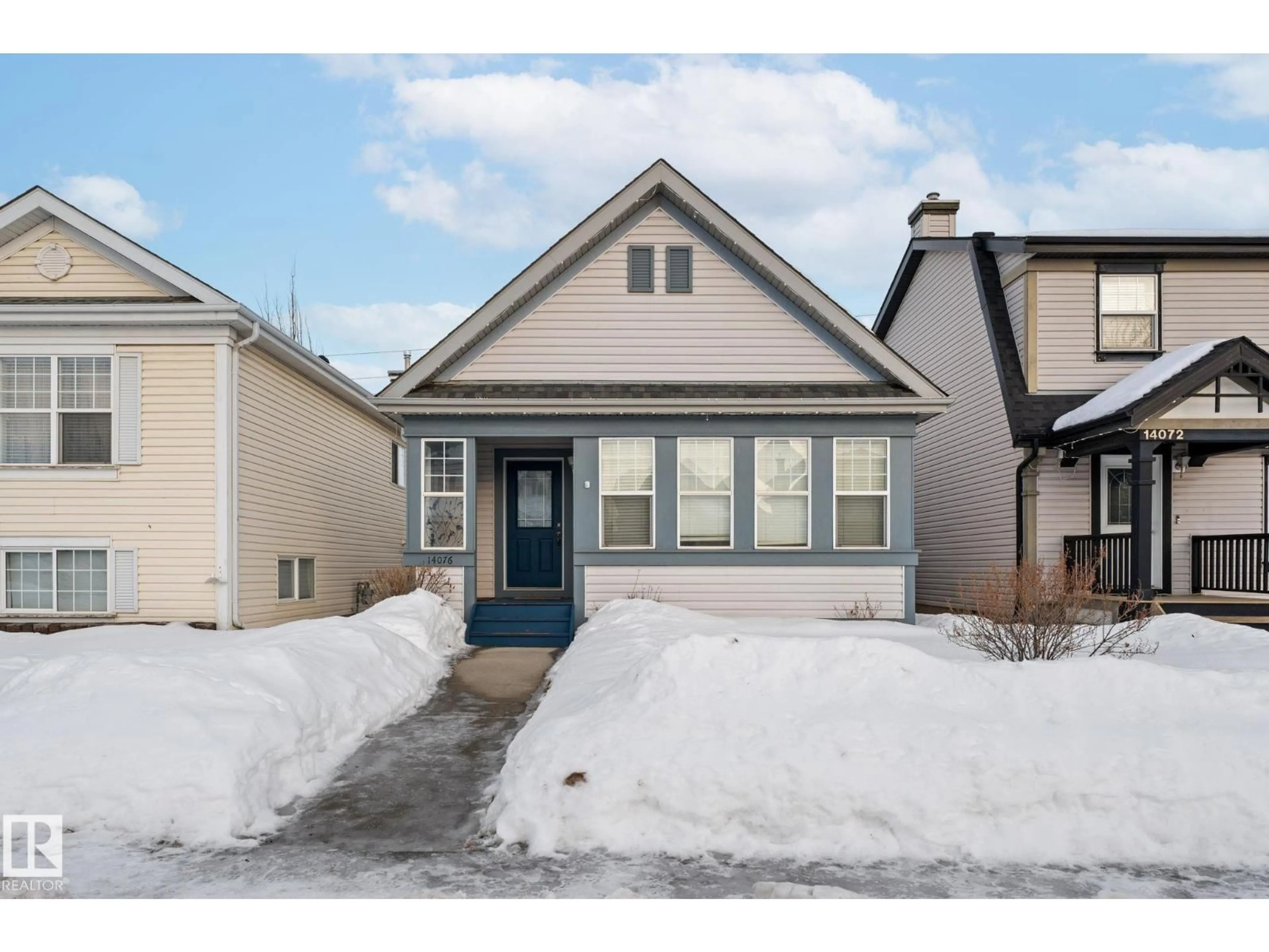 Home with vinyl exterior material, street for NW - 14076 152 AV, Edmonton Alberta T6V1T9