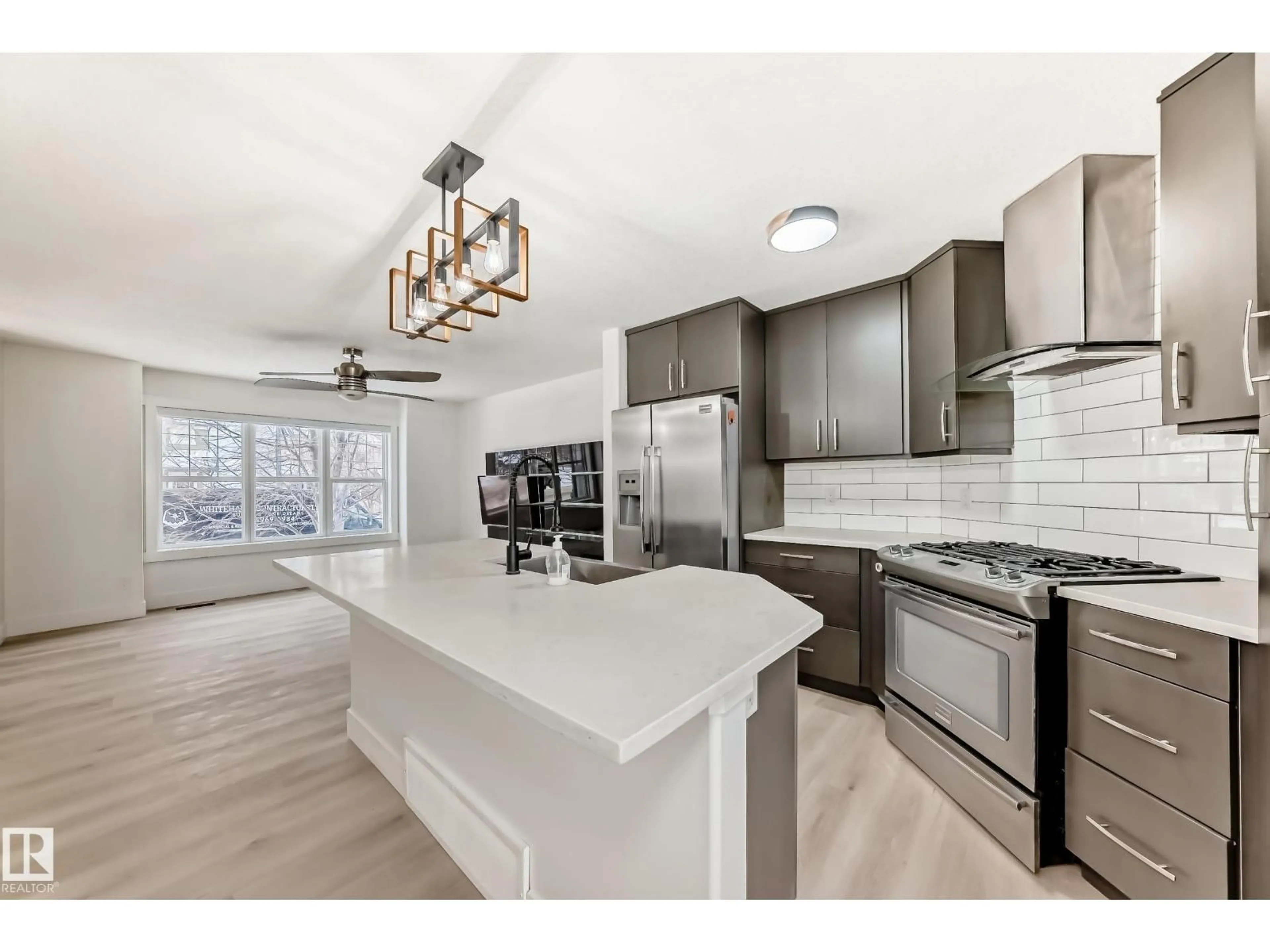 Open concept kitchen, ceramic/tile floor for 2123 32 ST, Edmonton Alberta T6T0K4