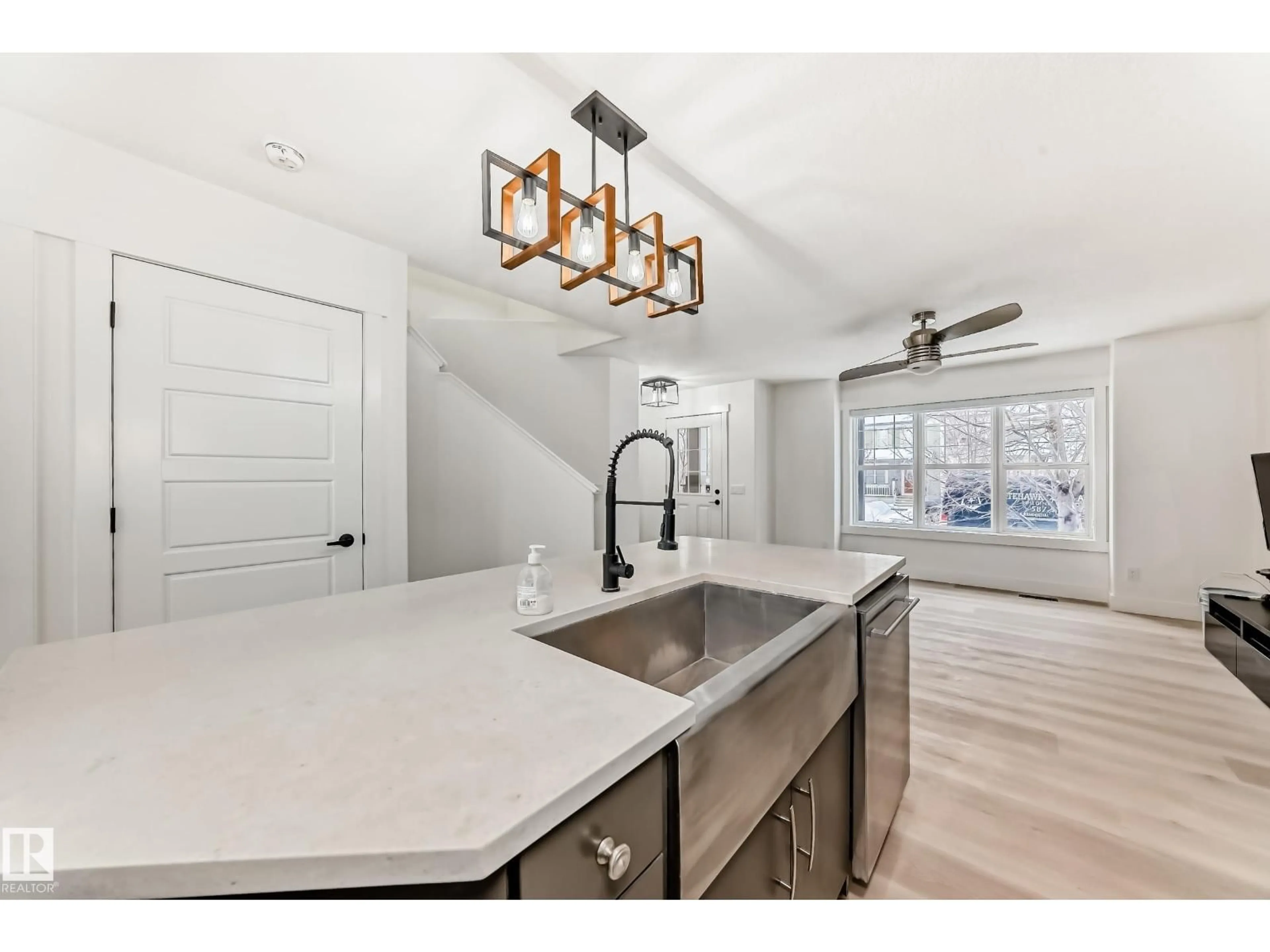 Open concept kitchen, ceramic/tile floor for 2123 32 ST, Edmonton Alberta T6T0K4