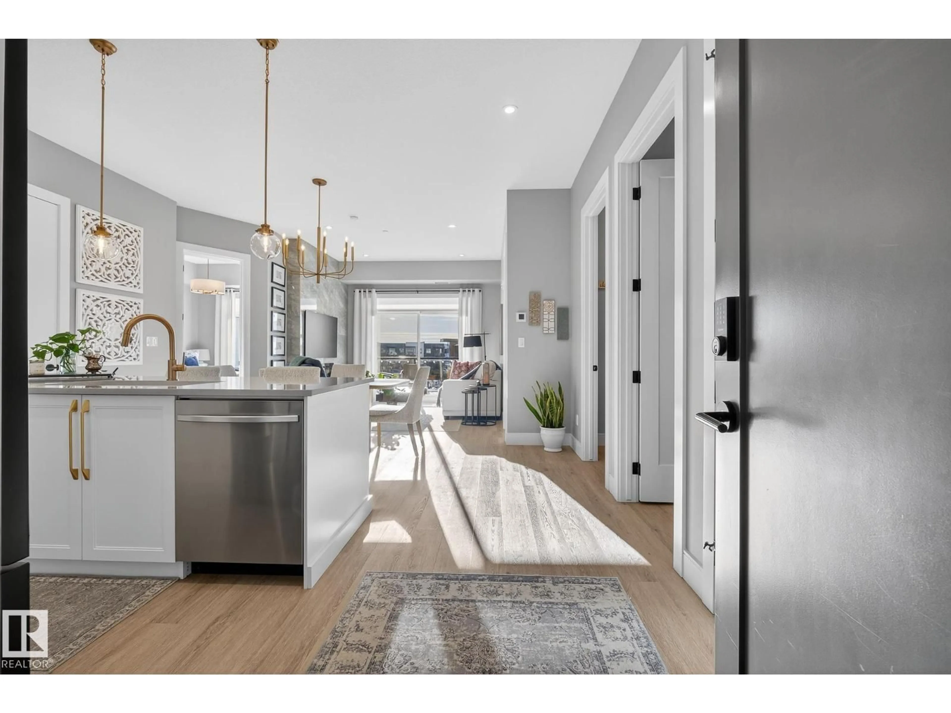 Open concept kitchen, unknown for 401 - 7471 MAY CM, Edmonton Alberta T6R0X5